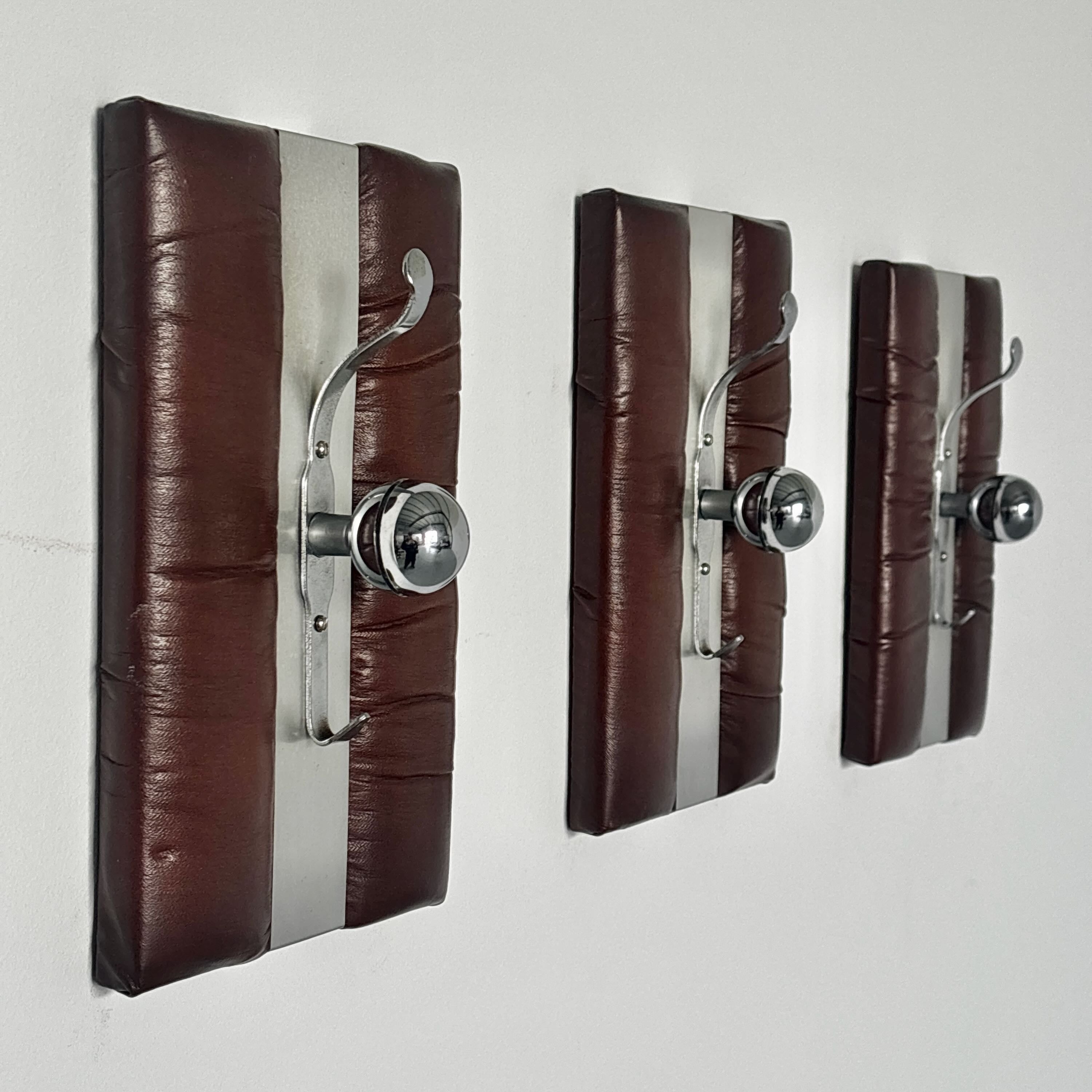 Wall-Mounted Coat Racks in Chrome and Leather