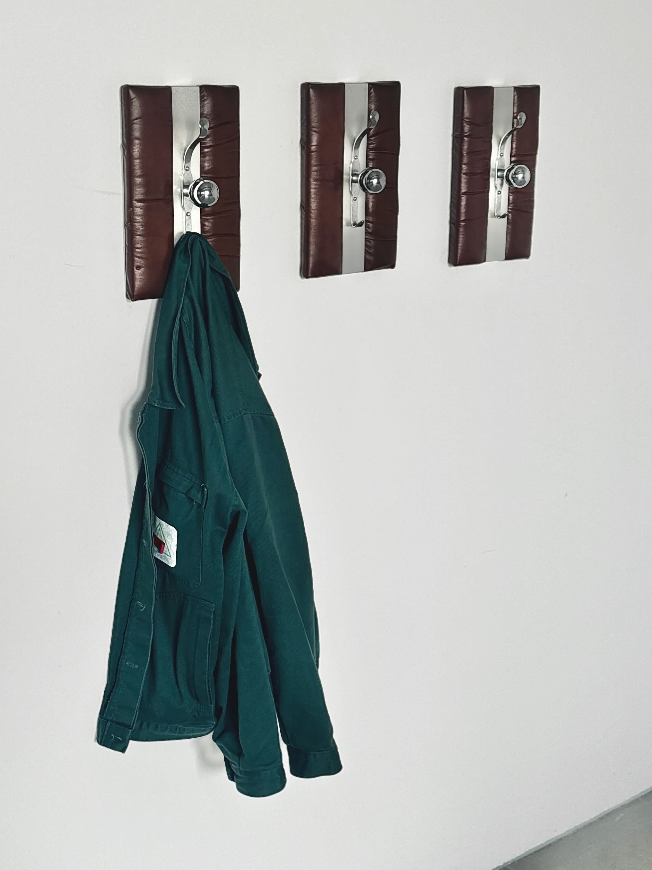 Wall-Mounted Coat Racks in Chrome and Leather