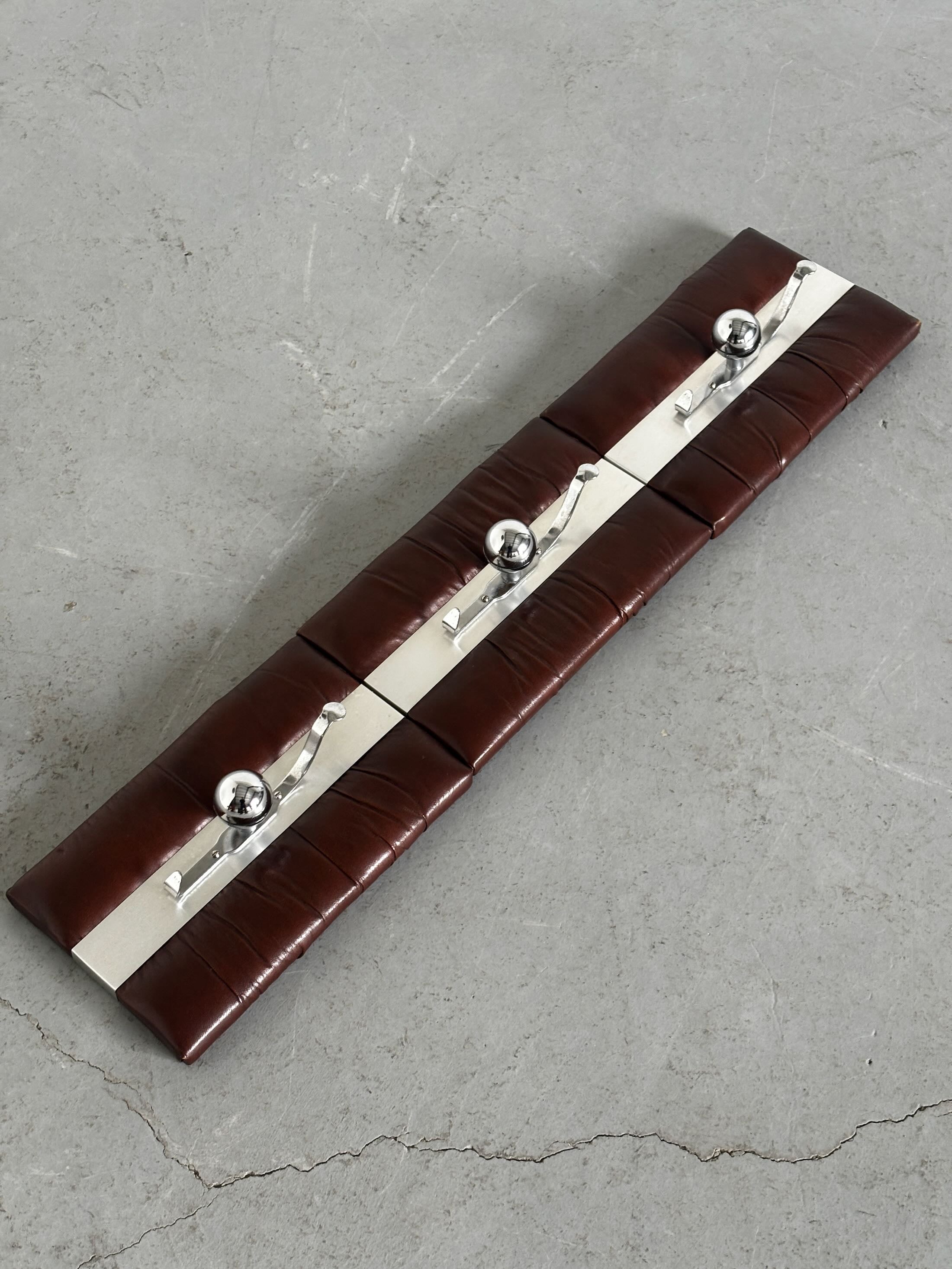 Wall-Mounted Coat Racks in Chrome and Leather