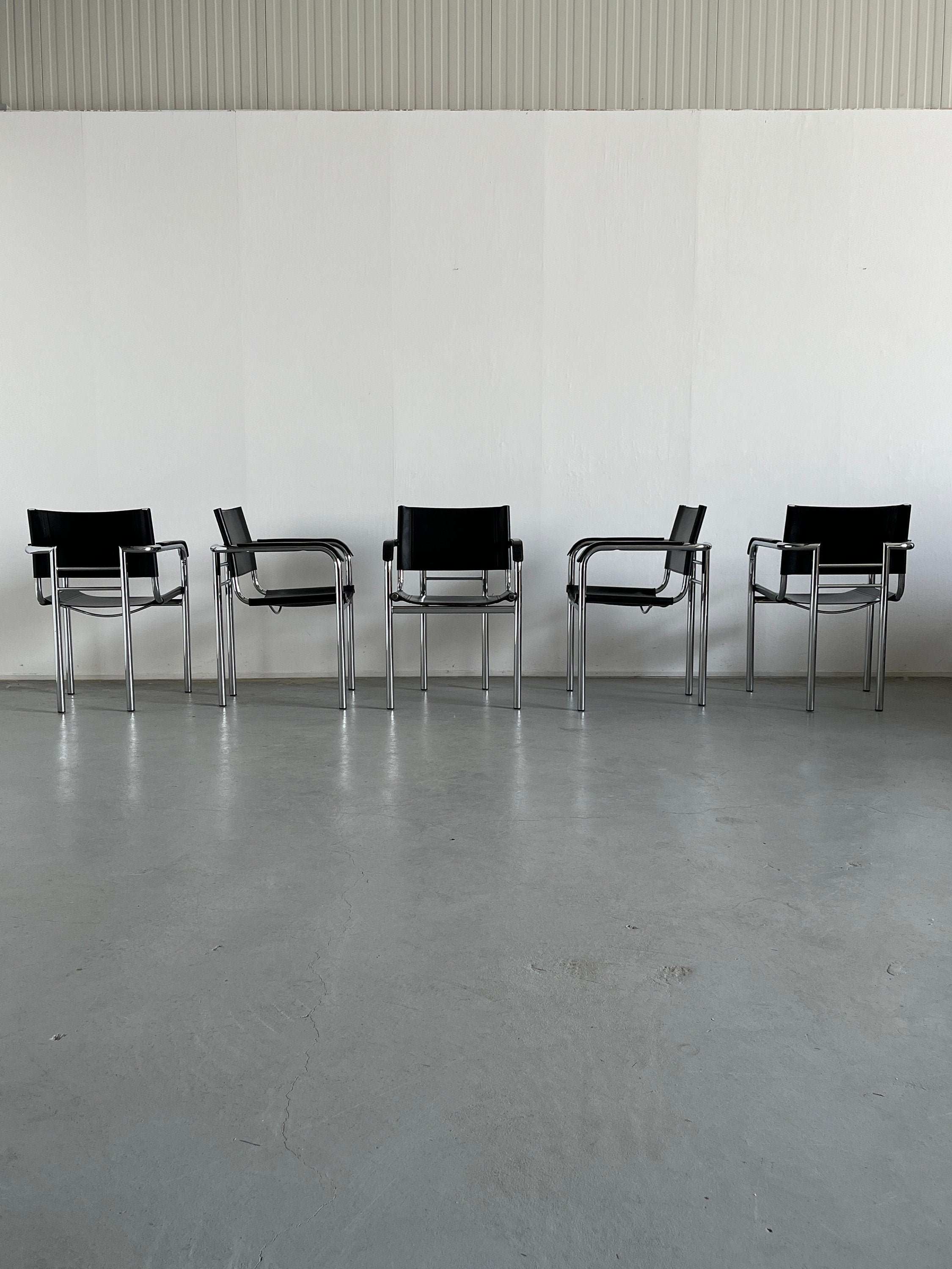 Modernist Armchairs in Tubular Frame and Black Leather, 1970s