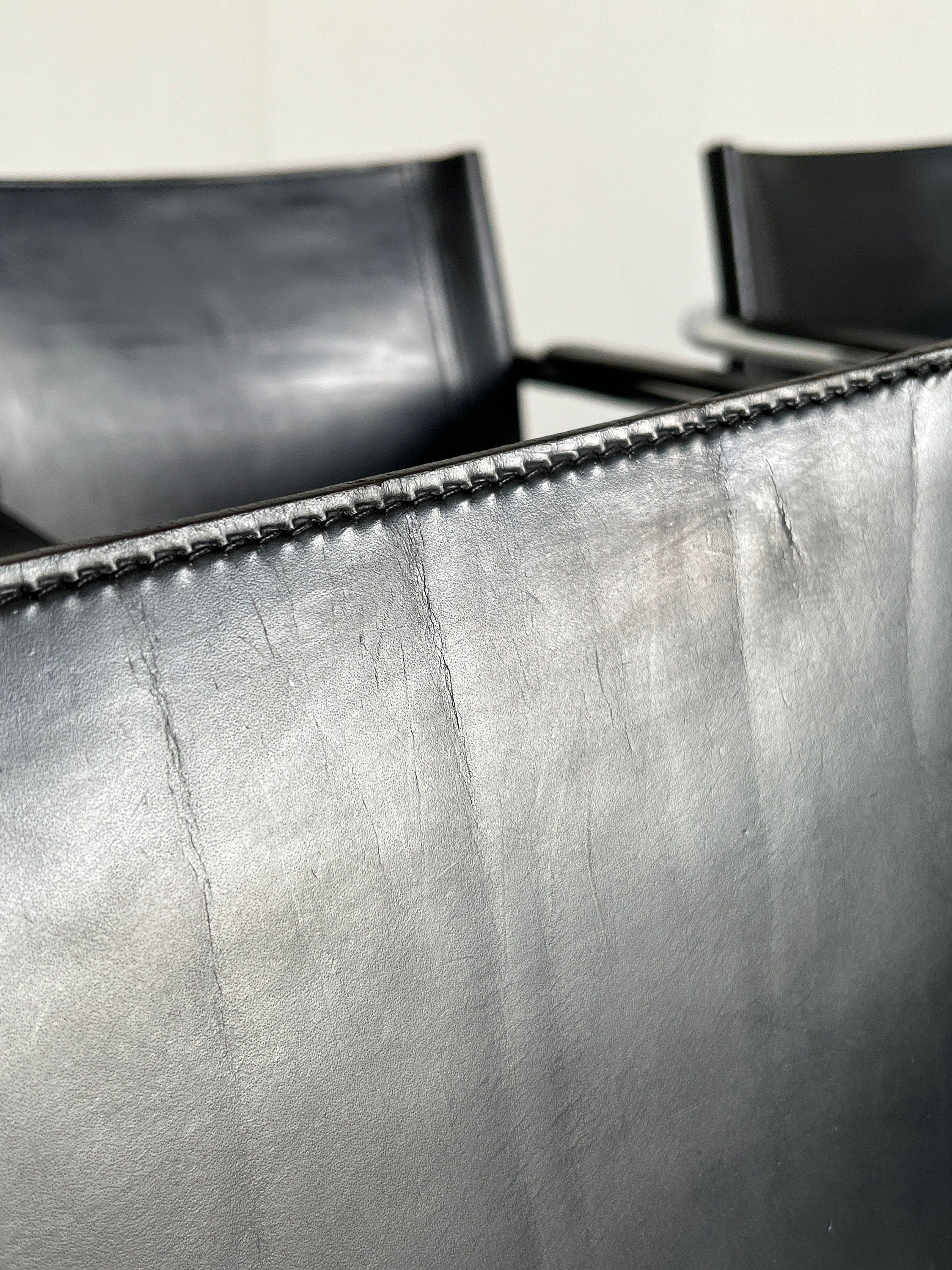 Modernist Armchairs in Tubular Frame and Black Leather, 1970s