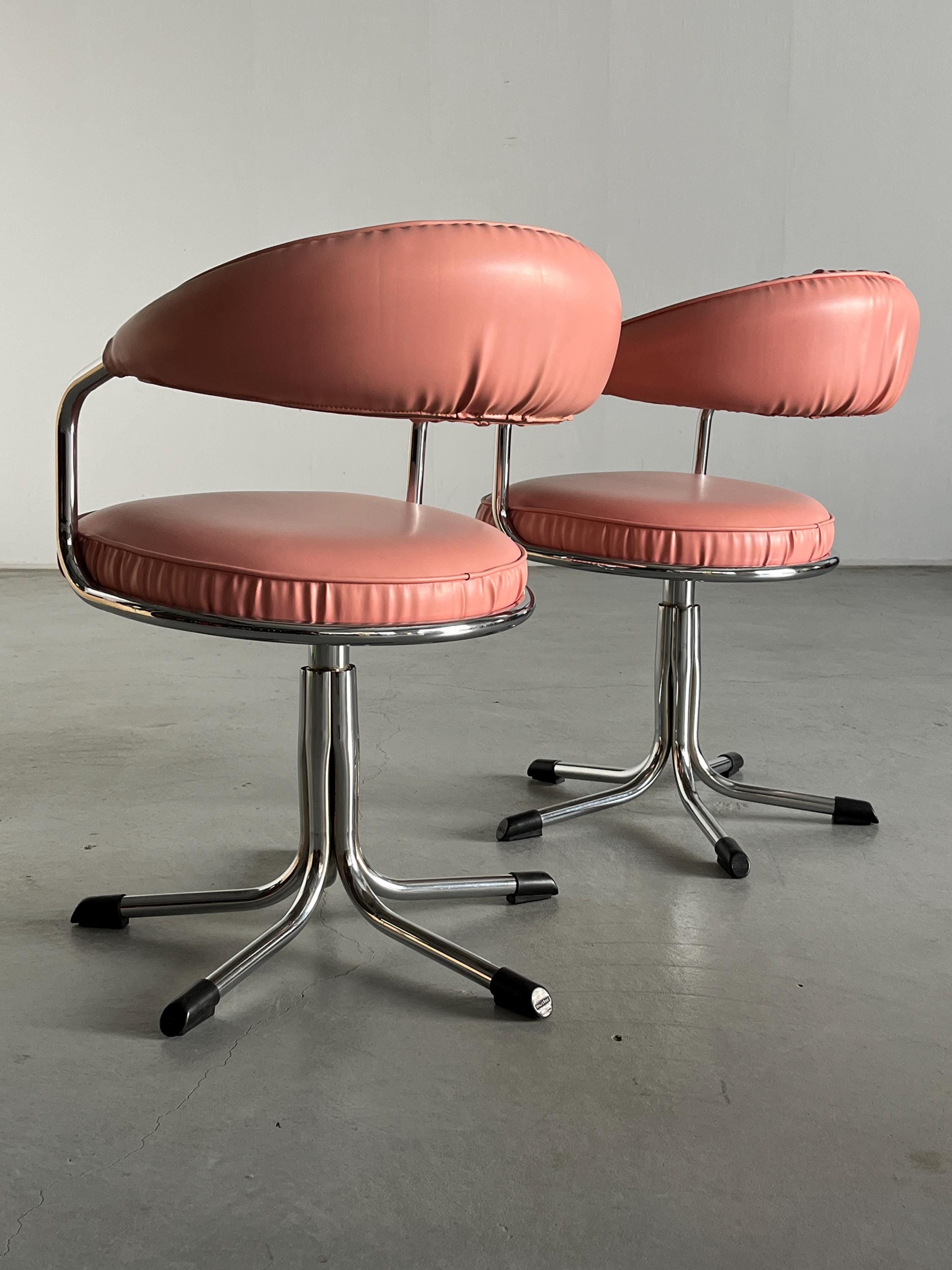 Swivel Armchairs in the style of Giotto Stoppino