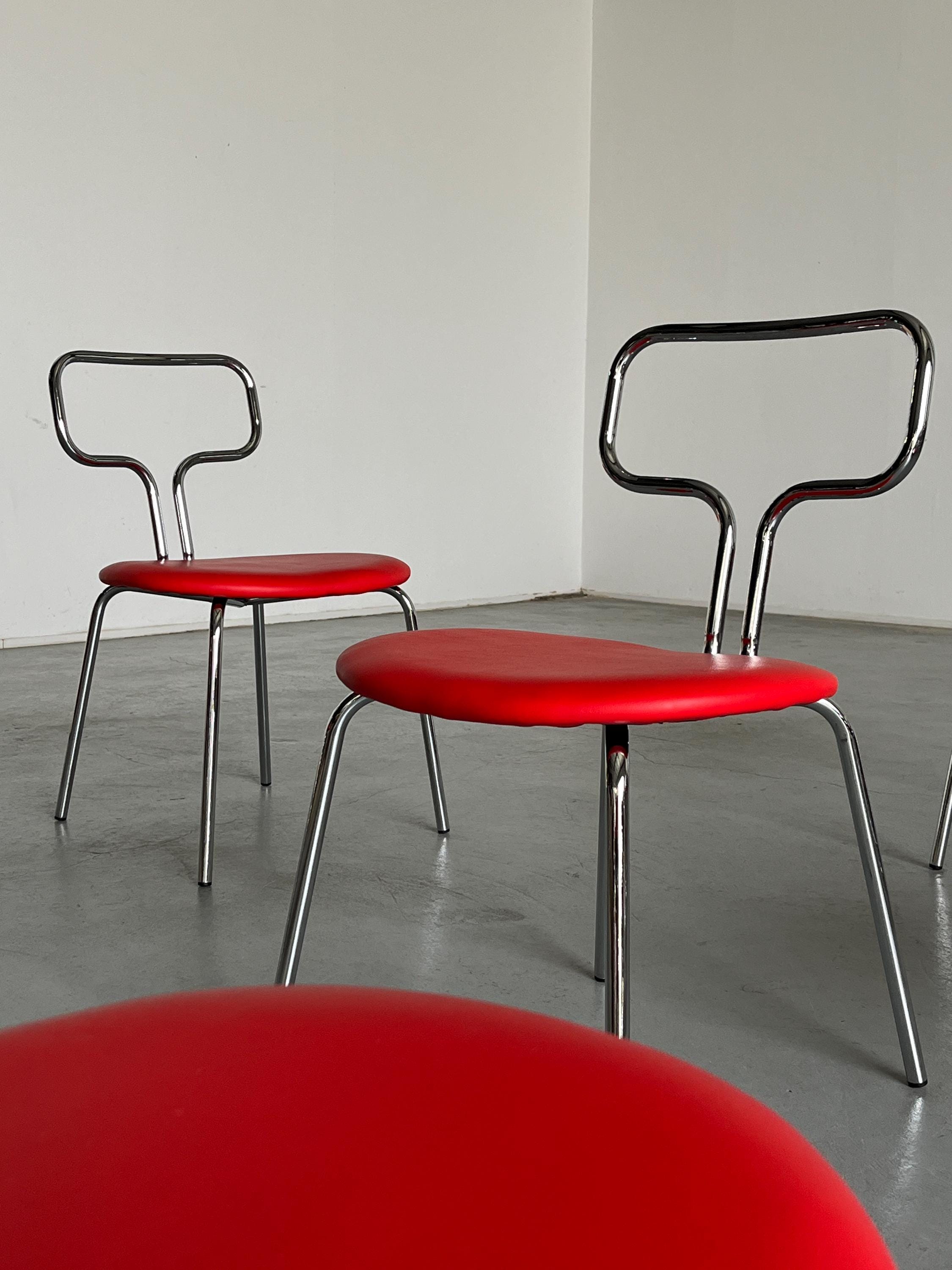 Curved Chrome Tubular Steel and Faux Leather Dining Chairs