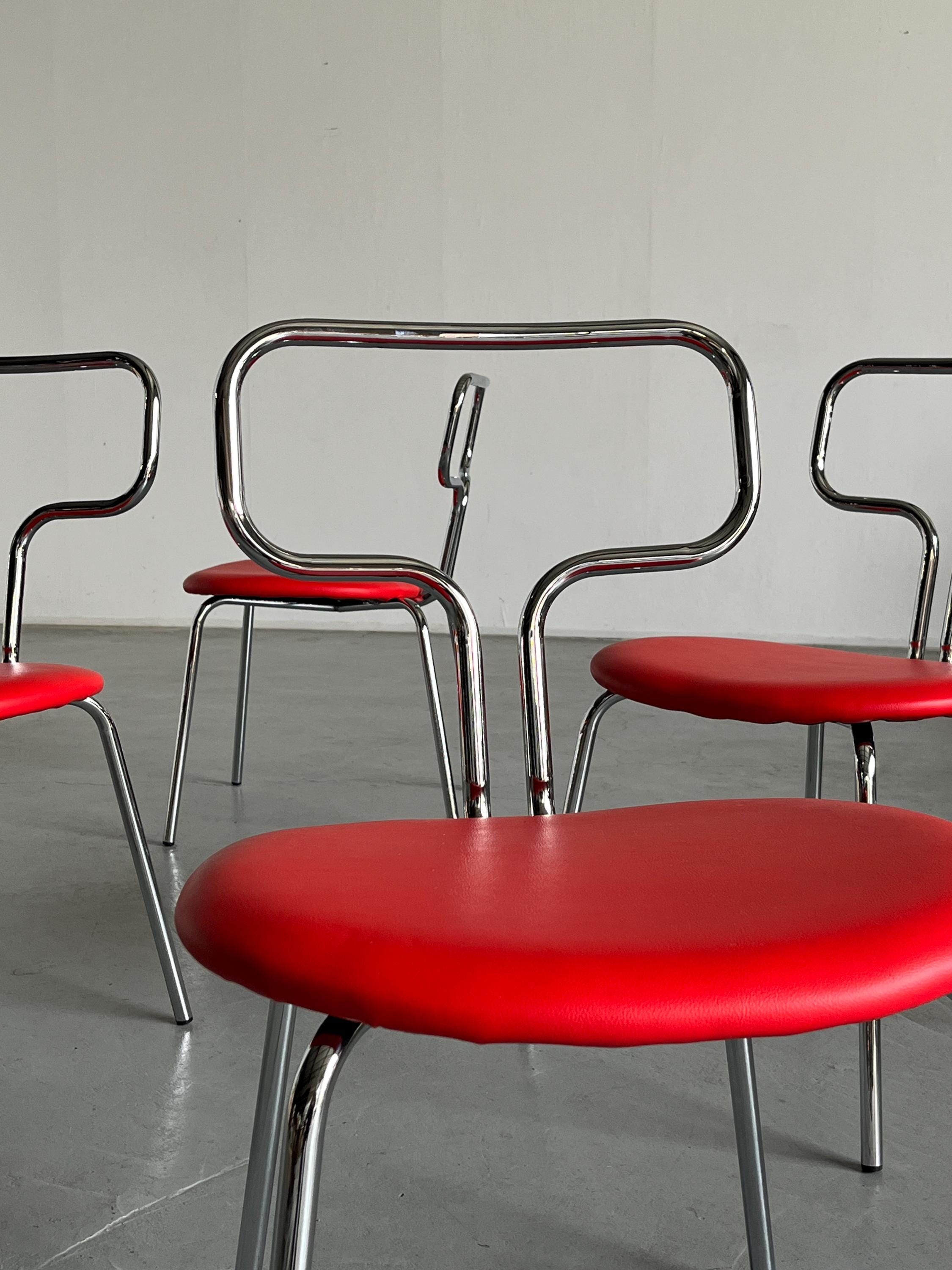Curved Chrome Tubular Steel and Faux Leather Dining Chairs