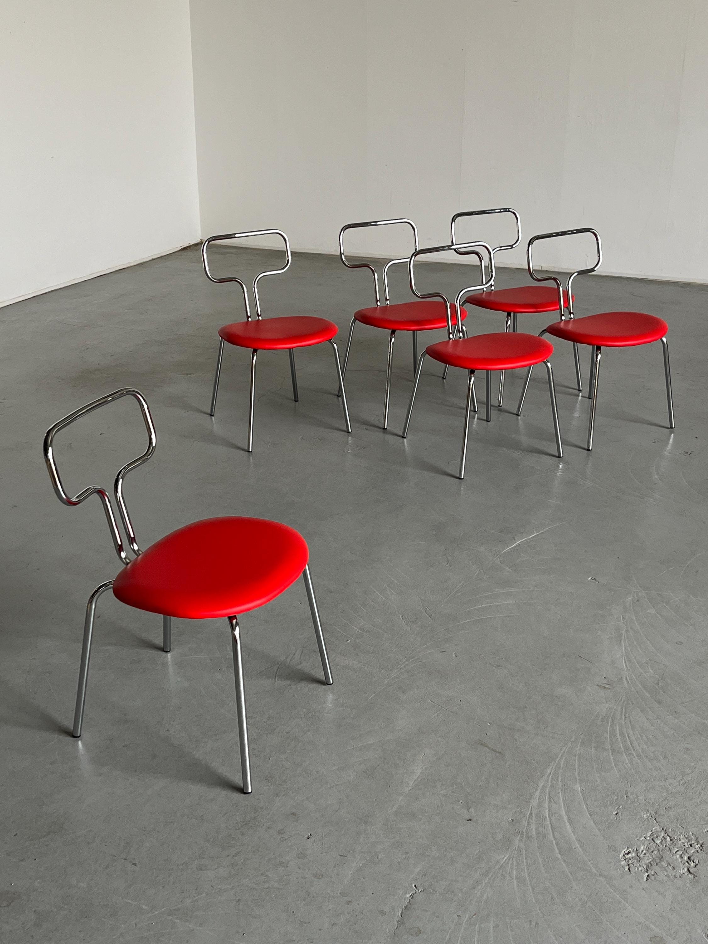 Curved Chrome Tubular Steel and Faux Leather Dining Chairs