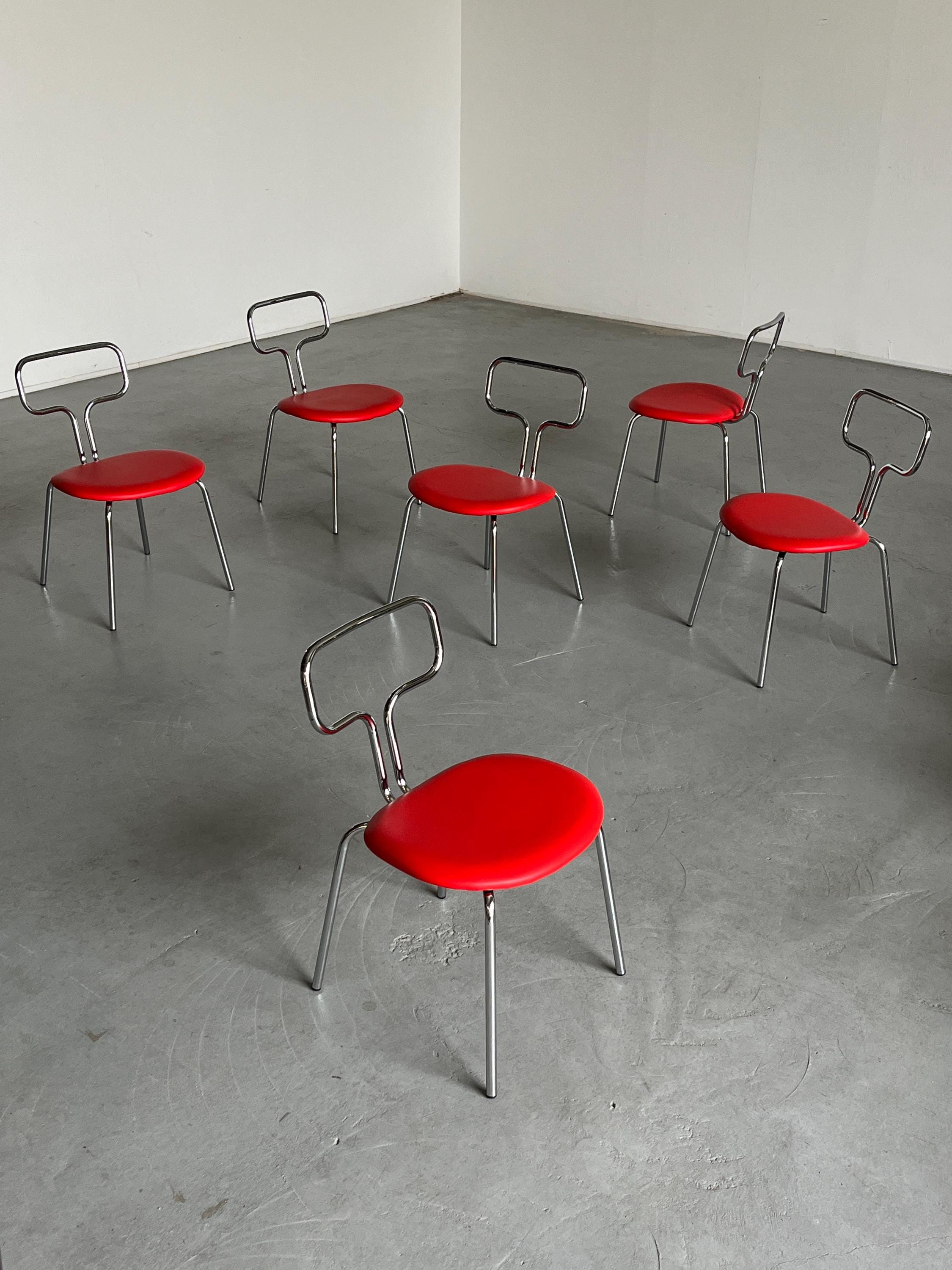 Curved Chrome Tubular Steel and Faux Leather Dining Chairs