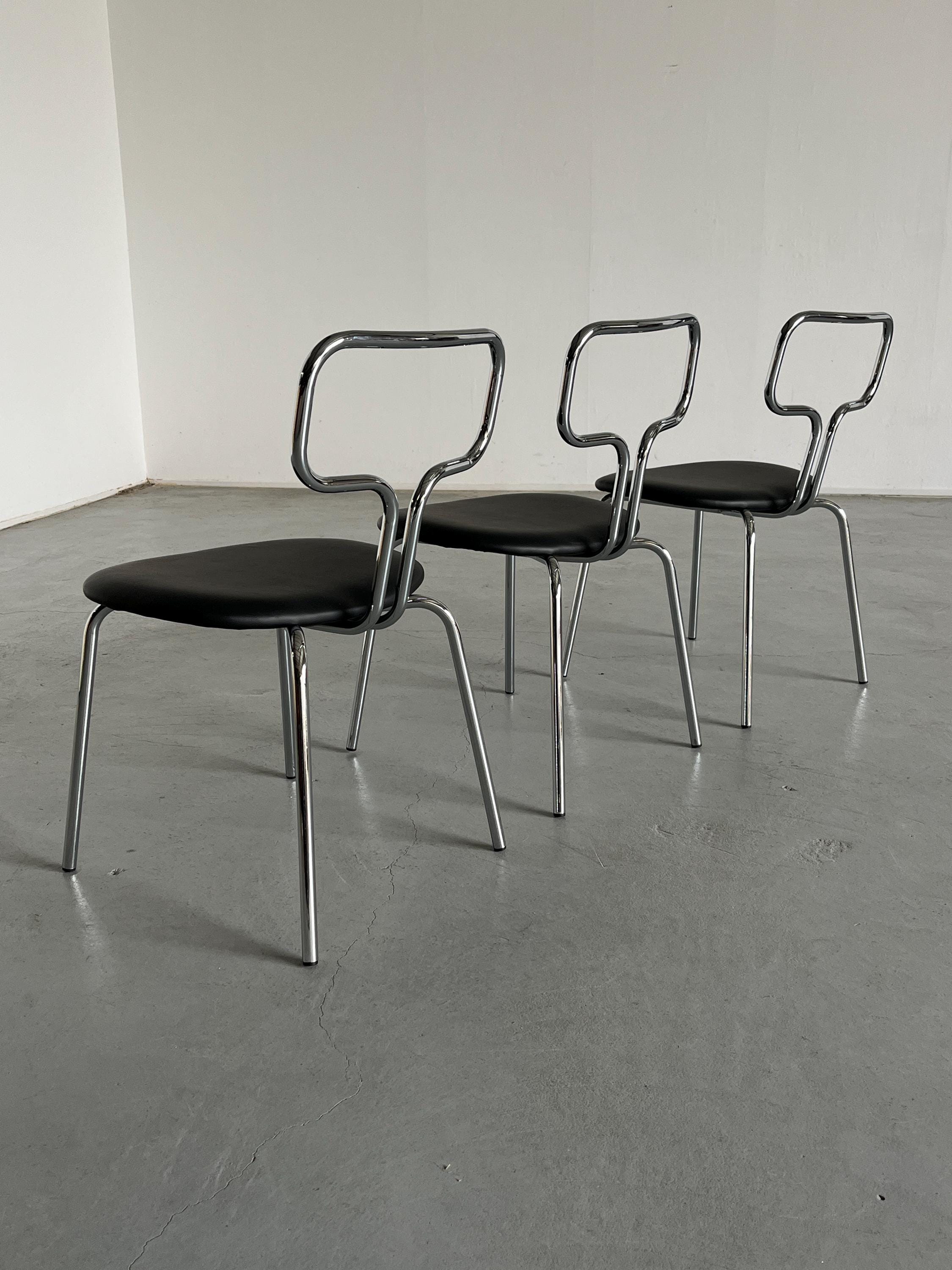 Curved Chrome Tubular Steel and Faux Leather Dining Chairs