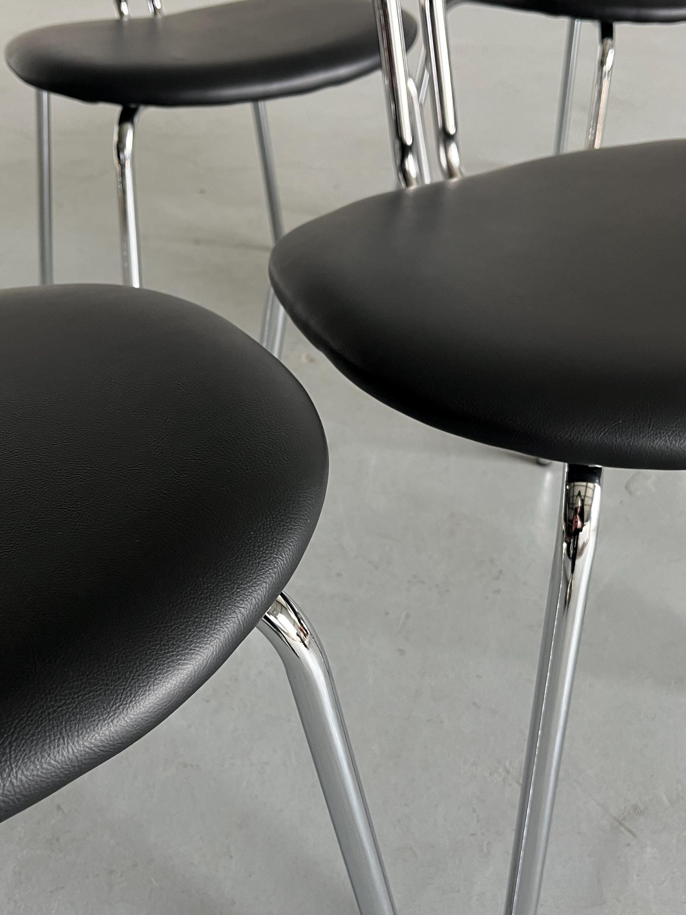 Curved Chrome Tubular Steel and Faux Leather Dining Chairs