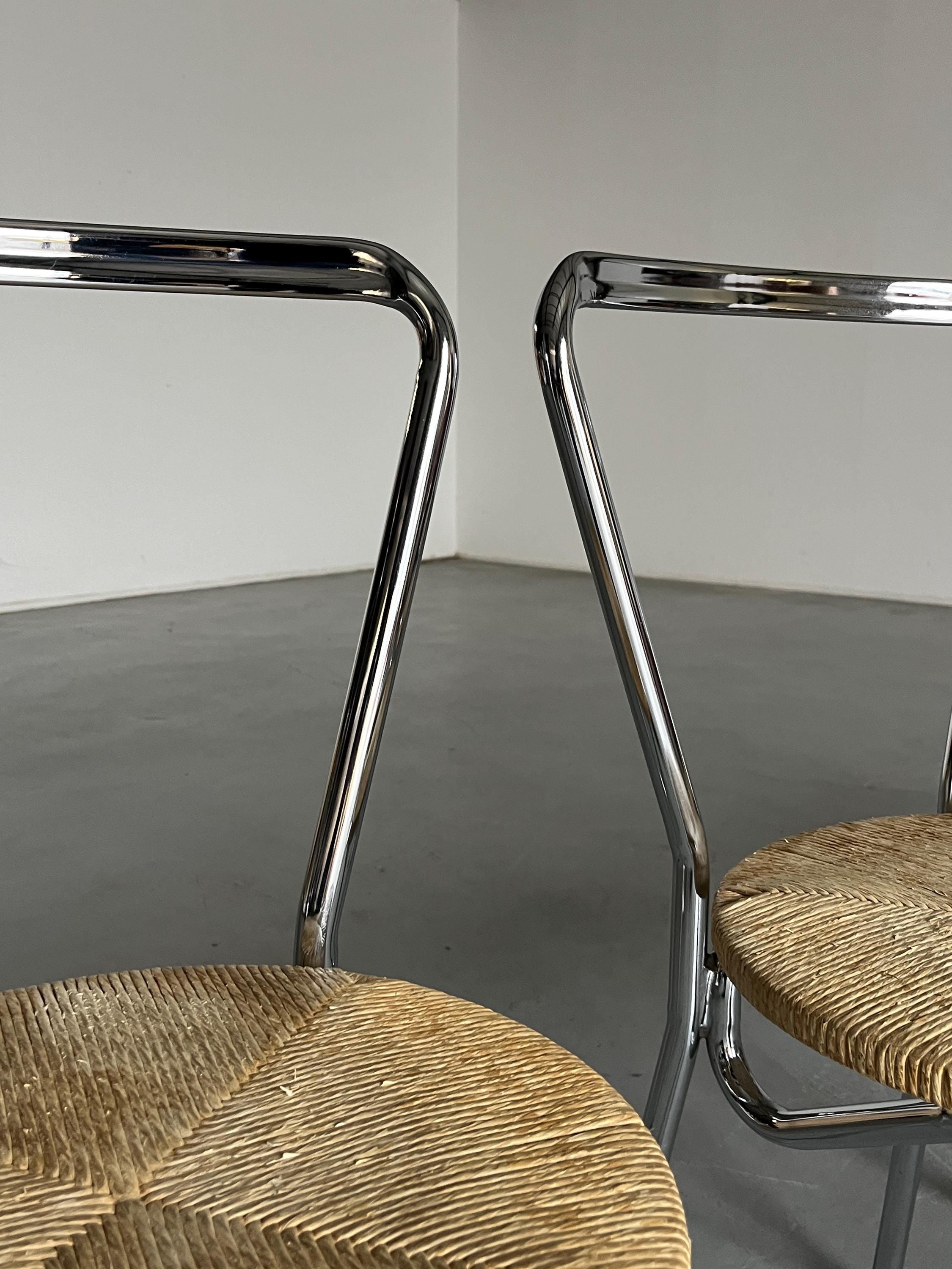 Modernist Dining Chairs in Chromed Steel and Woven Rope Seats