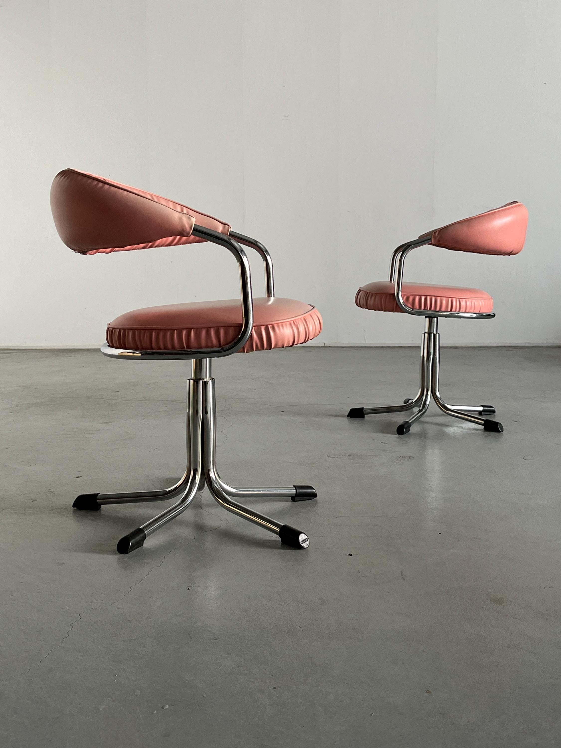 Swivel Armchairs in the style of Giotto Stoppino