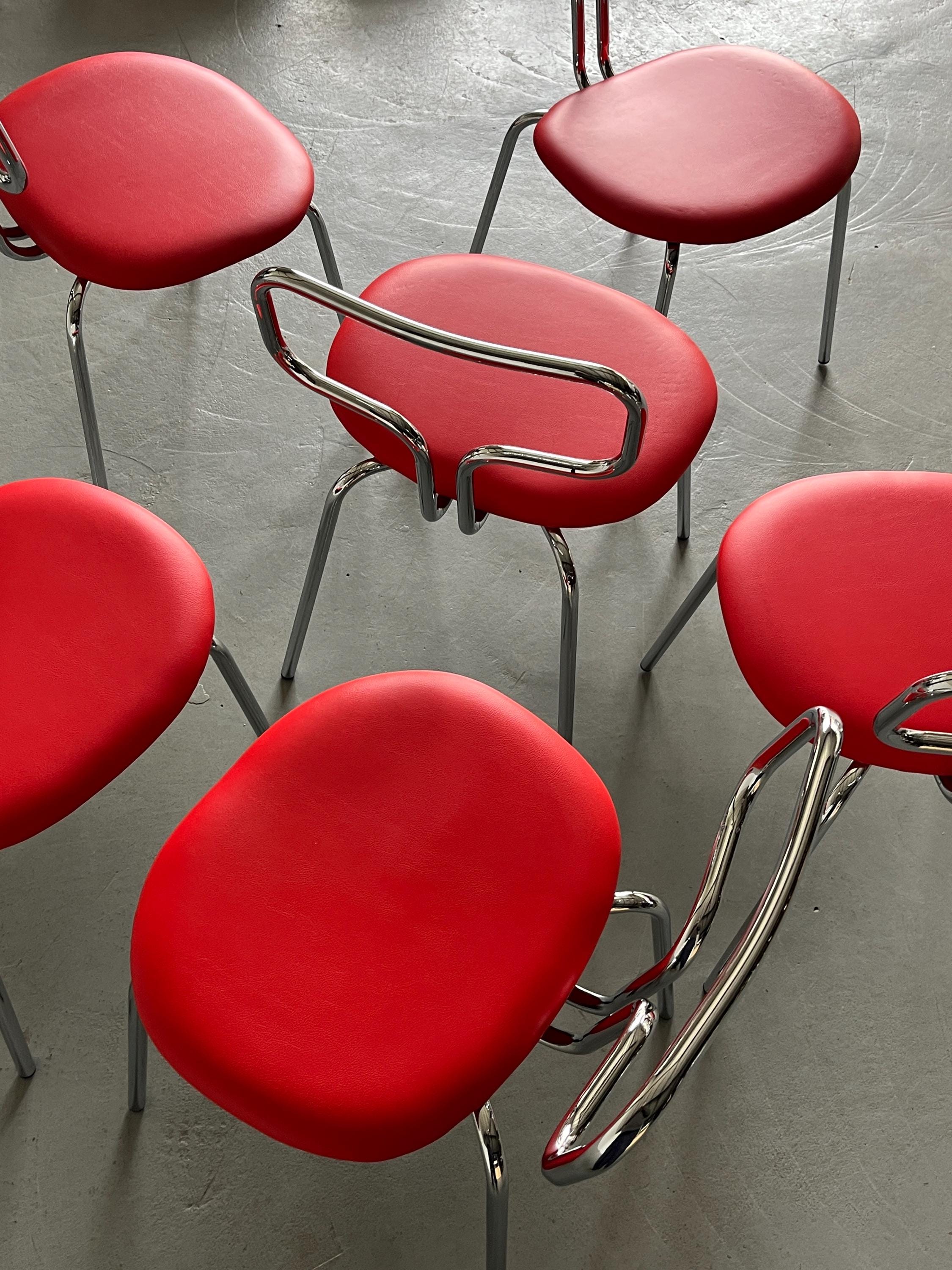 Curved Chrome Tubular Steel and Faux Leather Dining Chairs