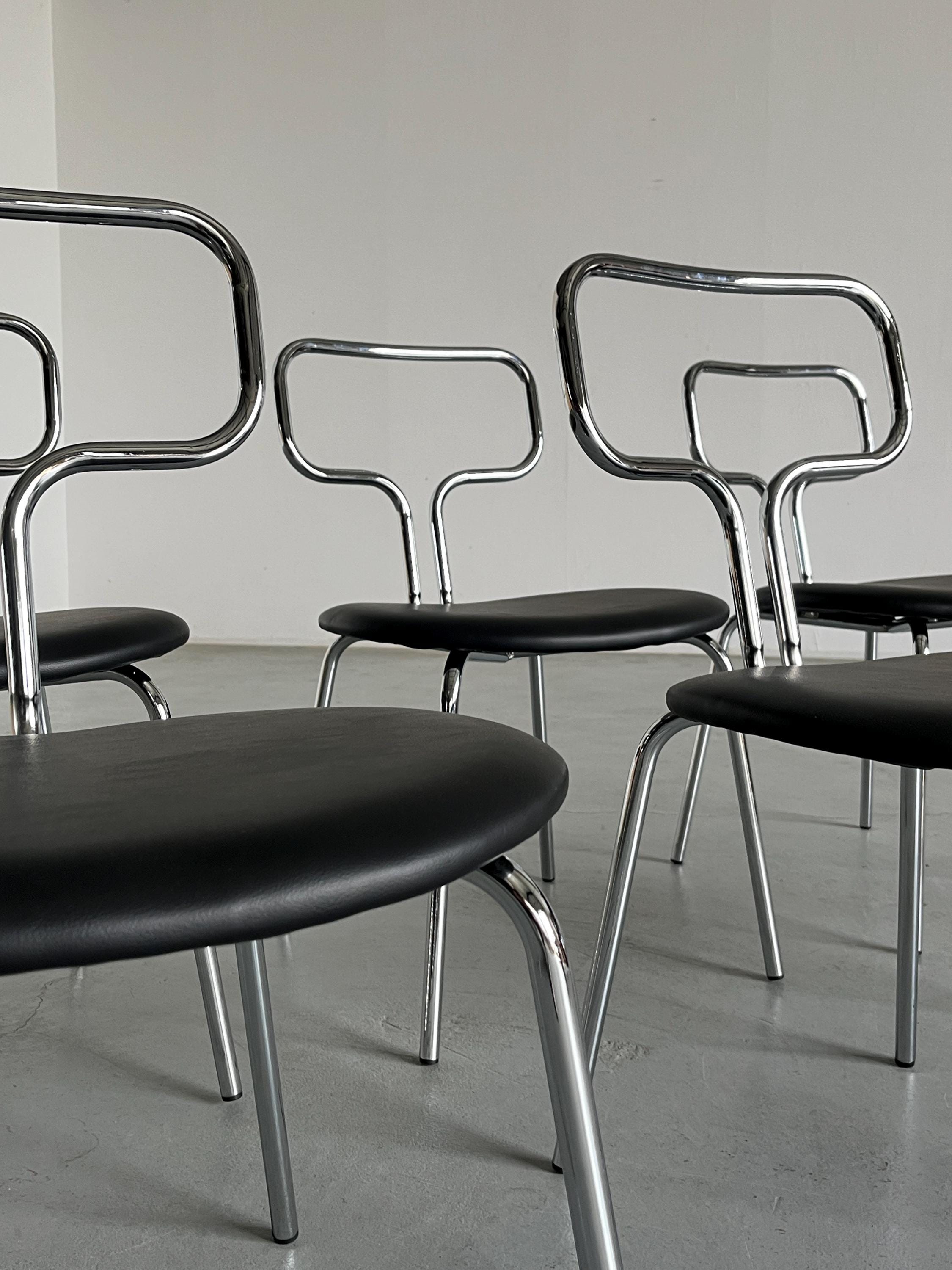 Curved Chrome Tubular Steel and Faux Leather Dining Chairs