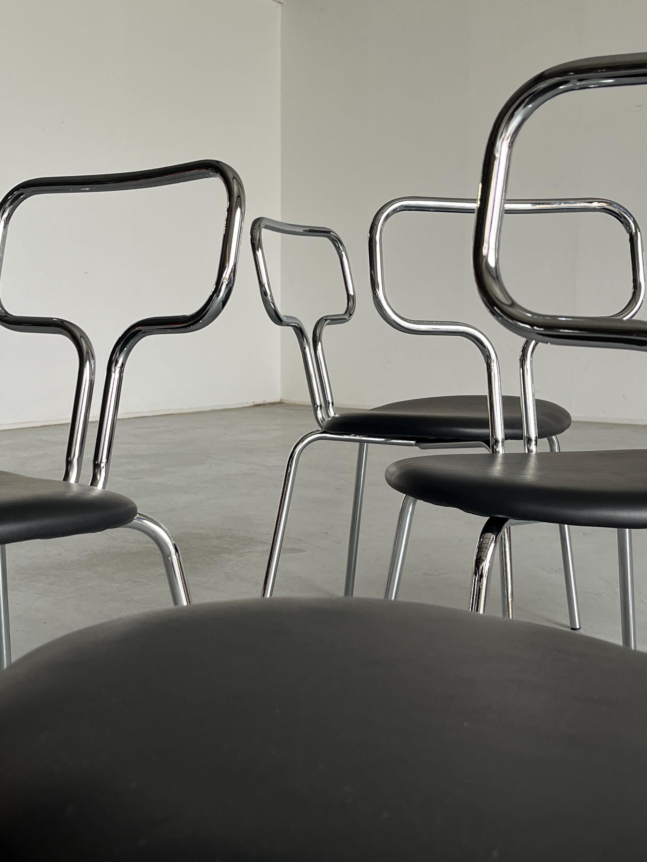 Curved Chrome Tubular Steel and Faux Leather Dining Chairs