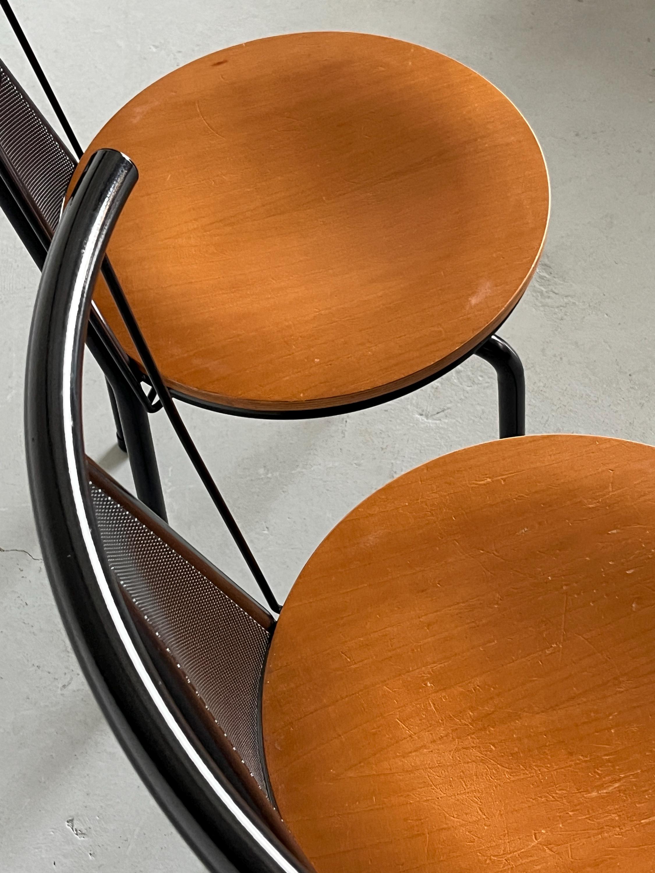 Postmodern Sculptural Dining Chairs in Black Metal with Circular Wooden Seats