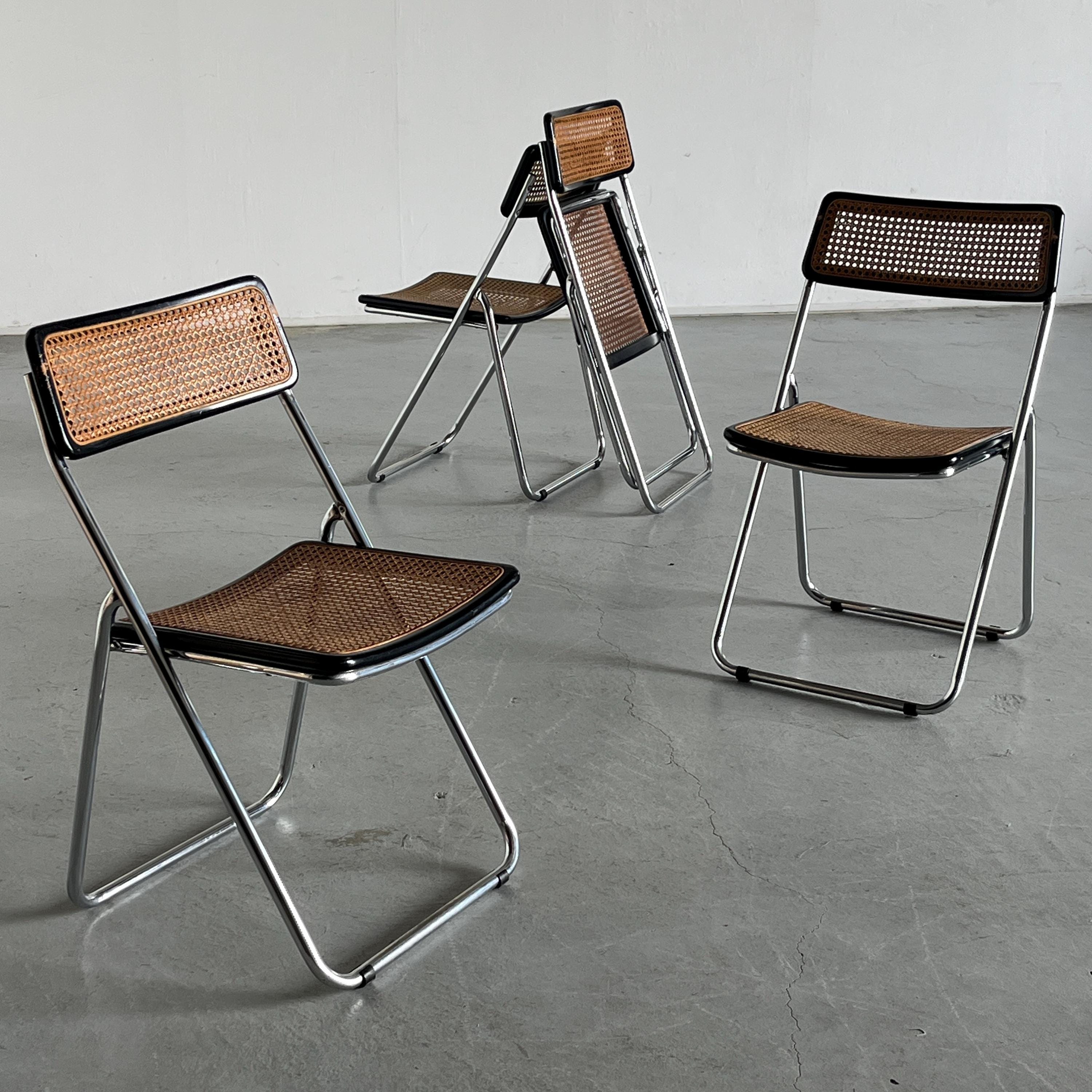 Folding Chrome and Cane Chairs