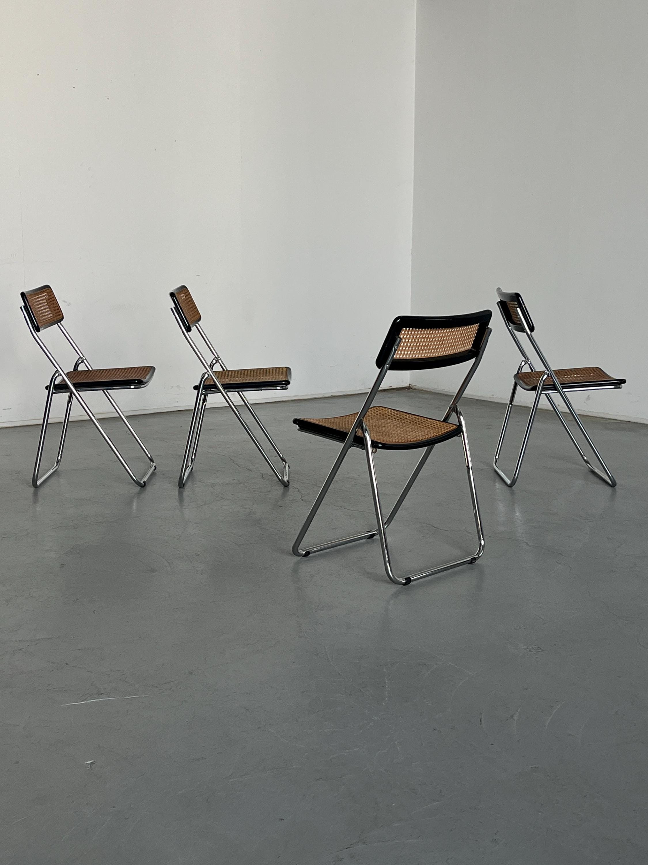 Folding Chrome and Cane Chairs