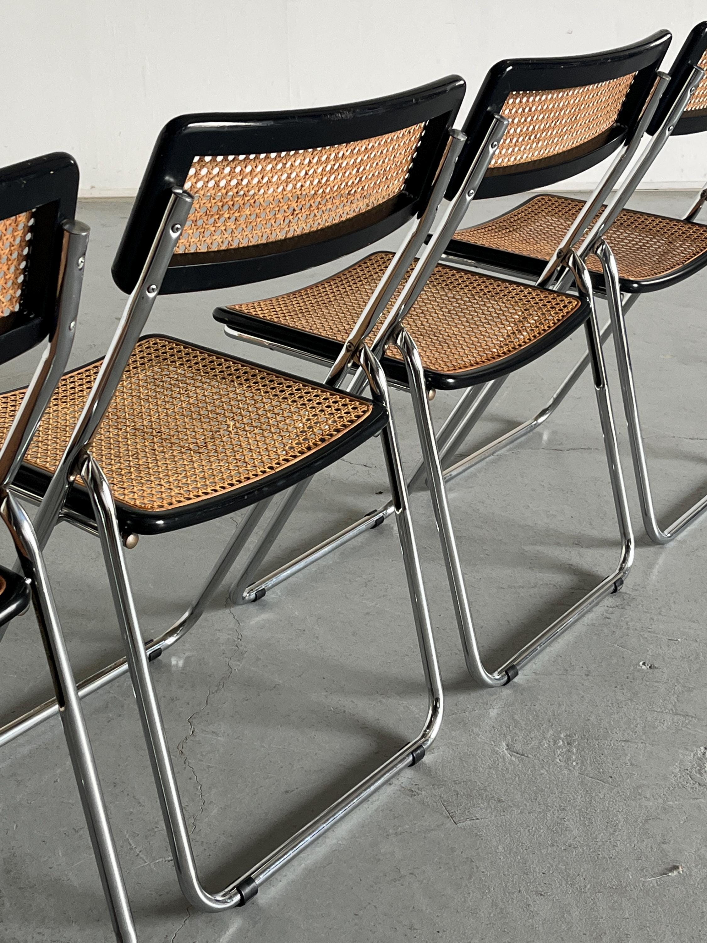 Folding Chrome and Cane Chairs