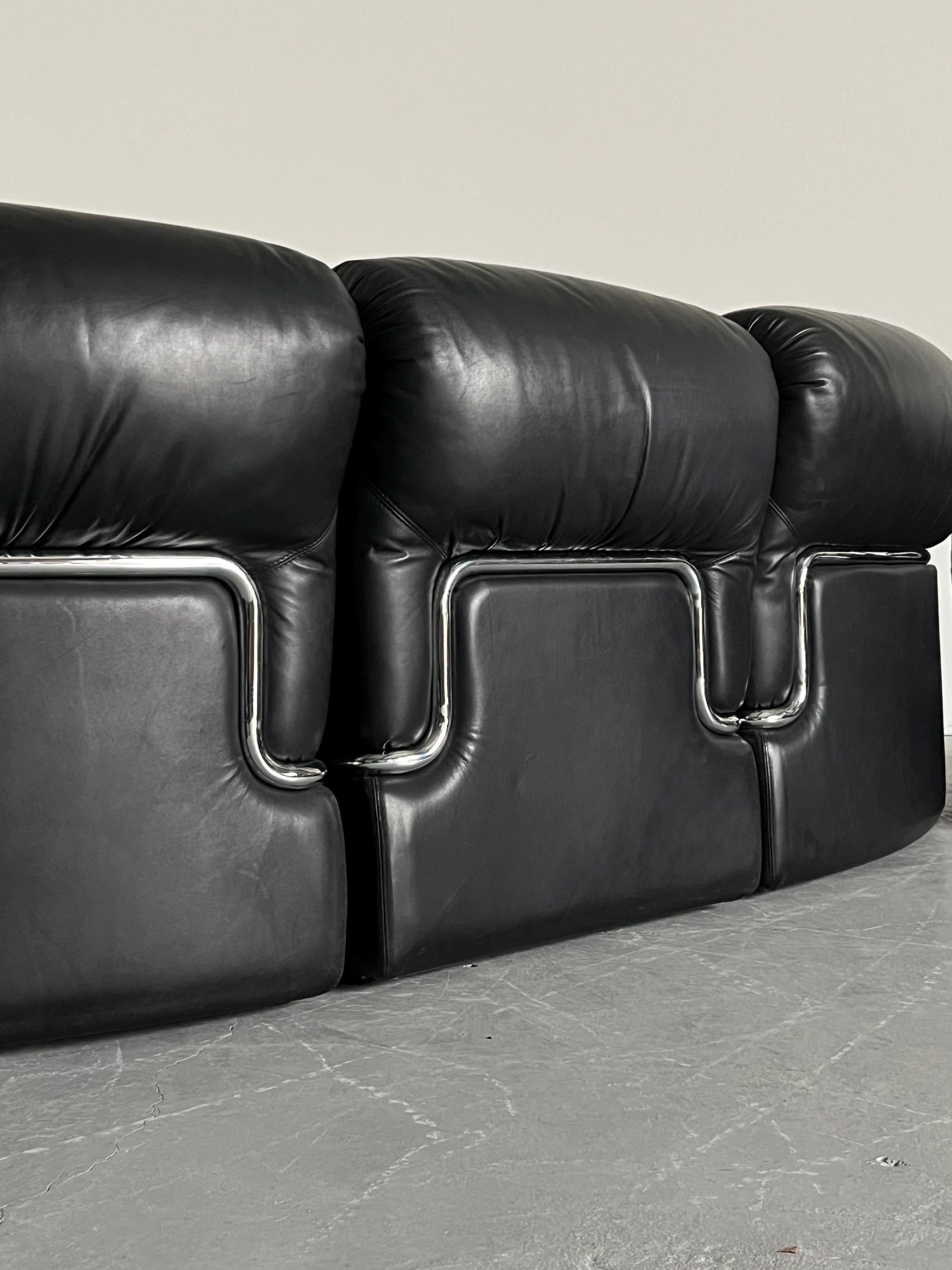 Elegant Italian Curved Leather Sofa with Chromed Frame