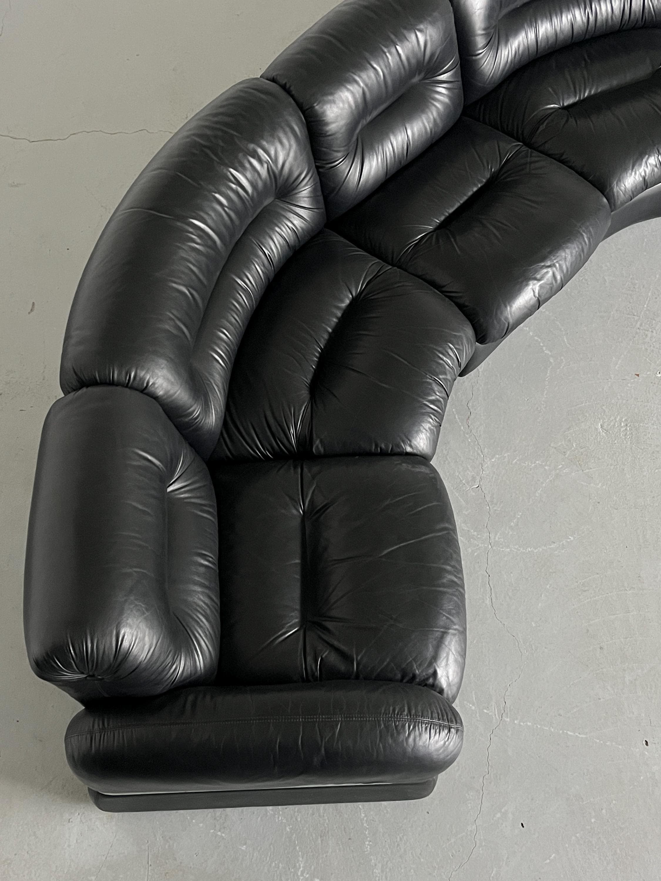 Elegant Italian Curved Leather Sofa with Chromed Frame