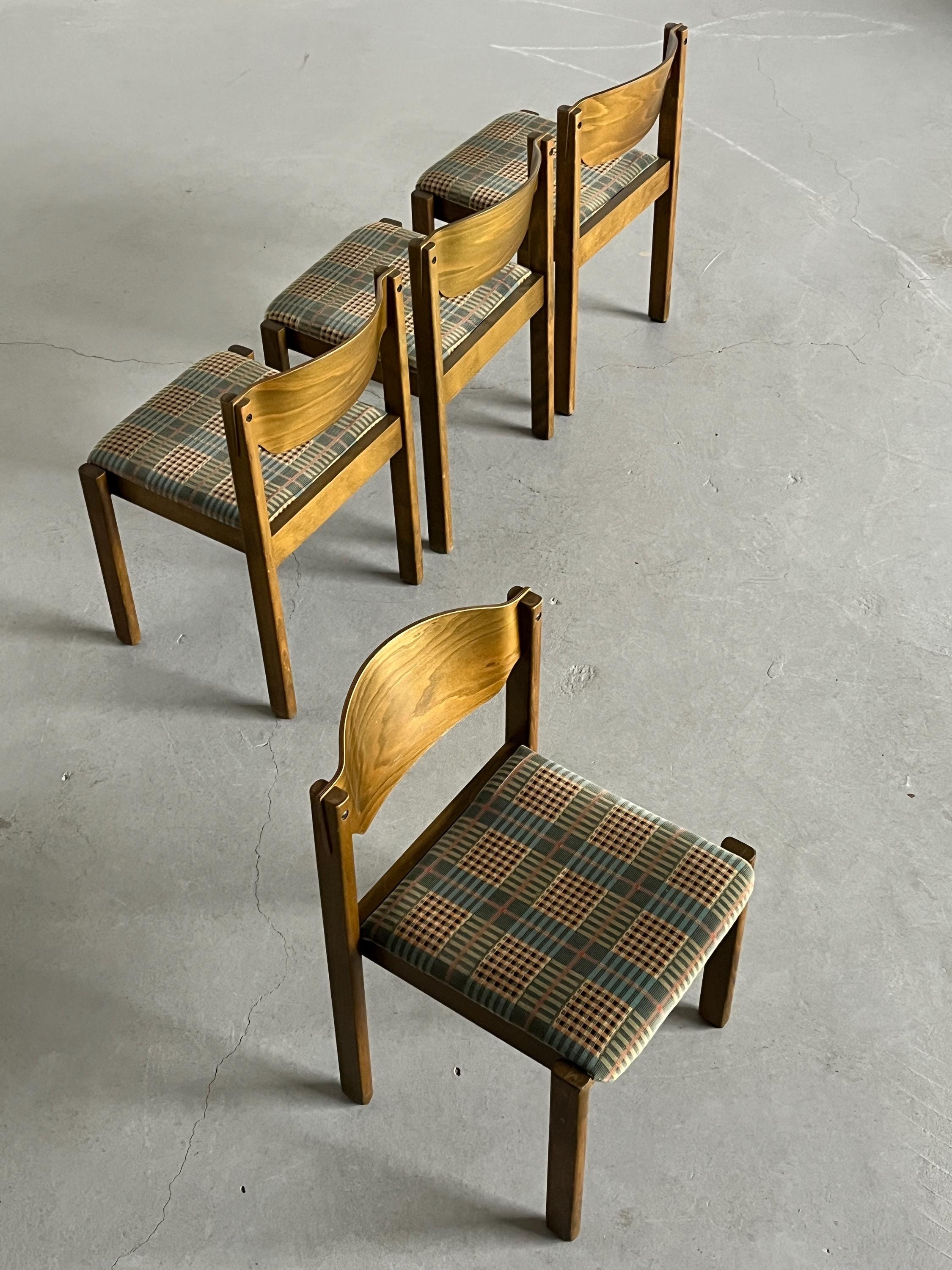 Stackable Dining Chairs in the Style of Roland Rainer