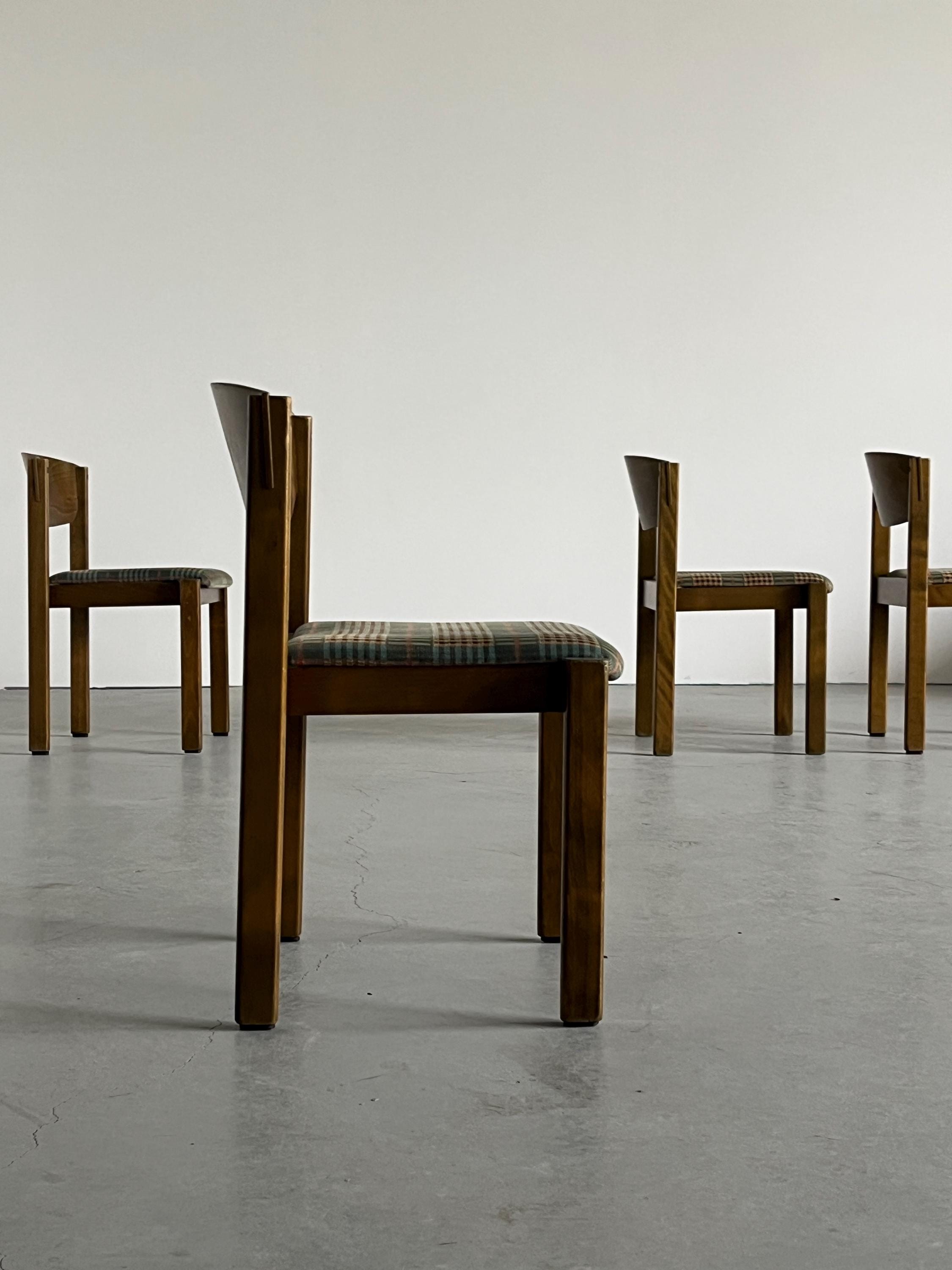 Stackable Dining Chairs in the Style of Roland Rainer