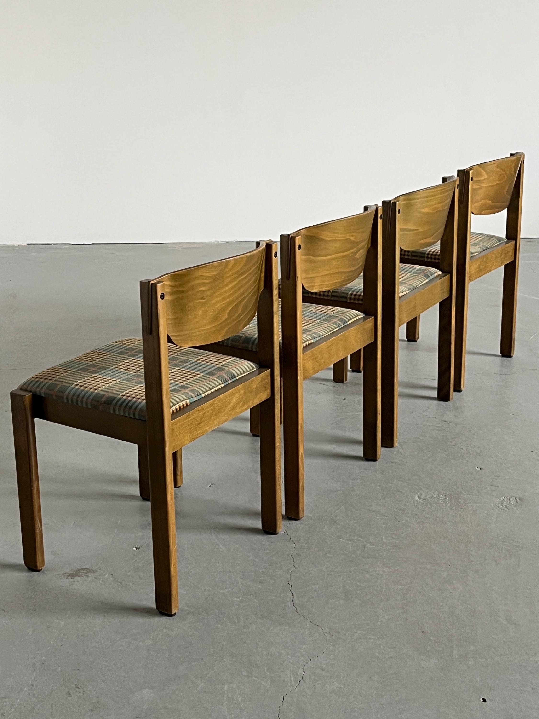 Stackable Dining Chairs in the Style of Roland Rainer
