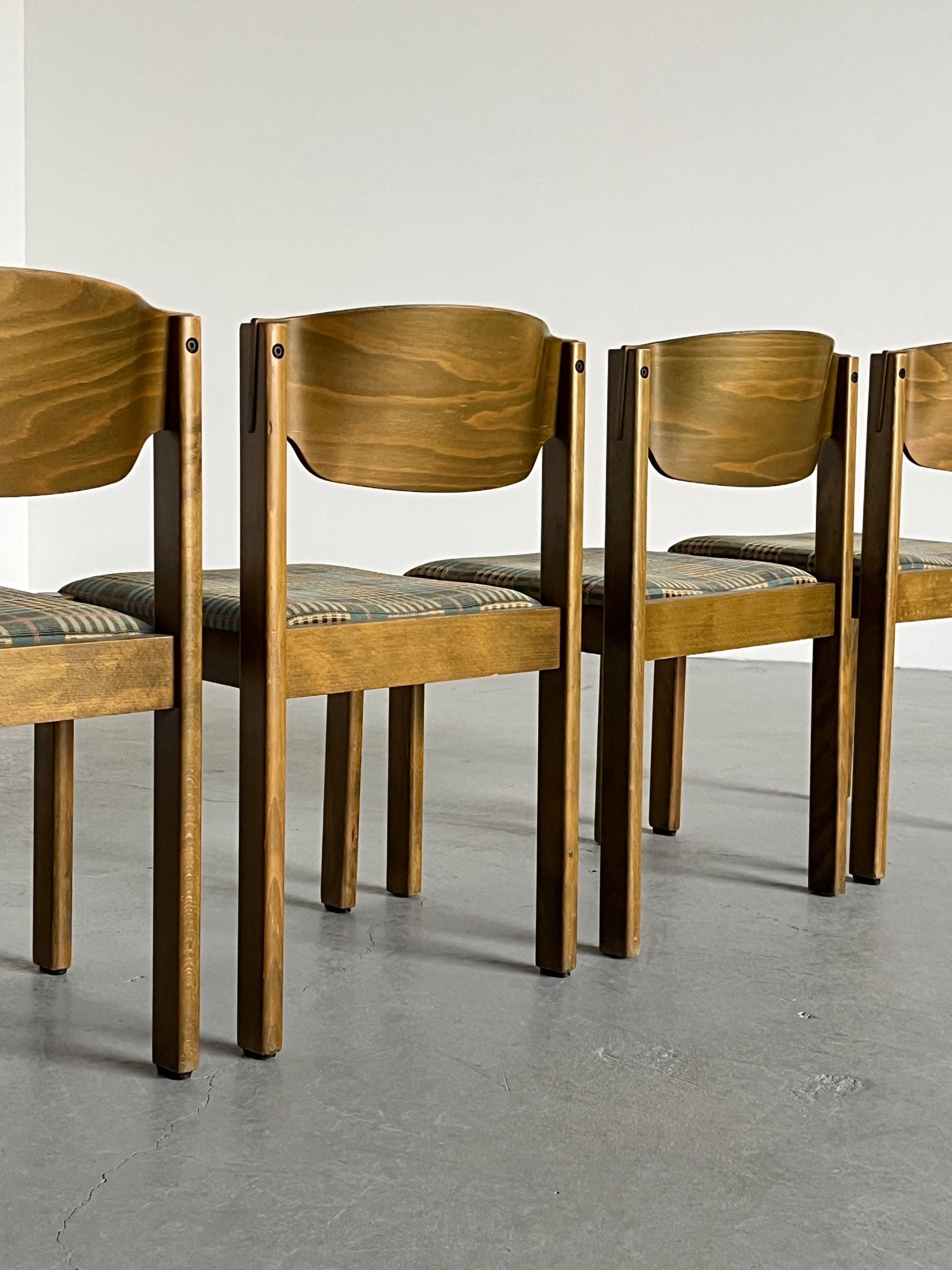 Stackable Dining Chairs in the Style of Roland Rainer