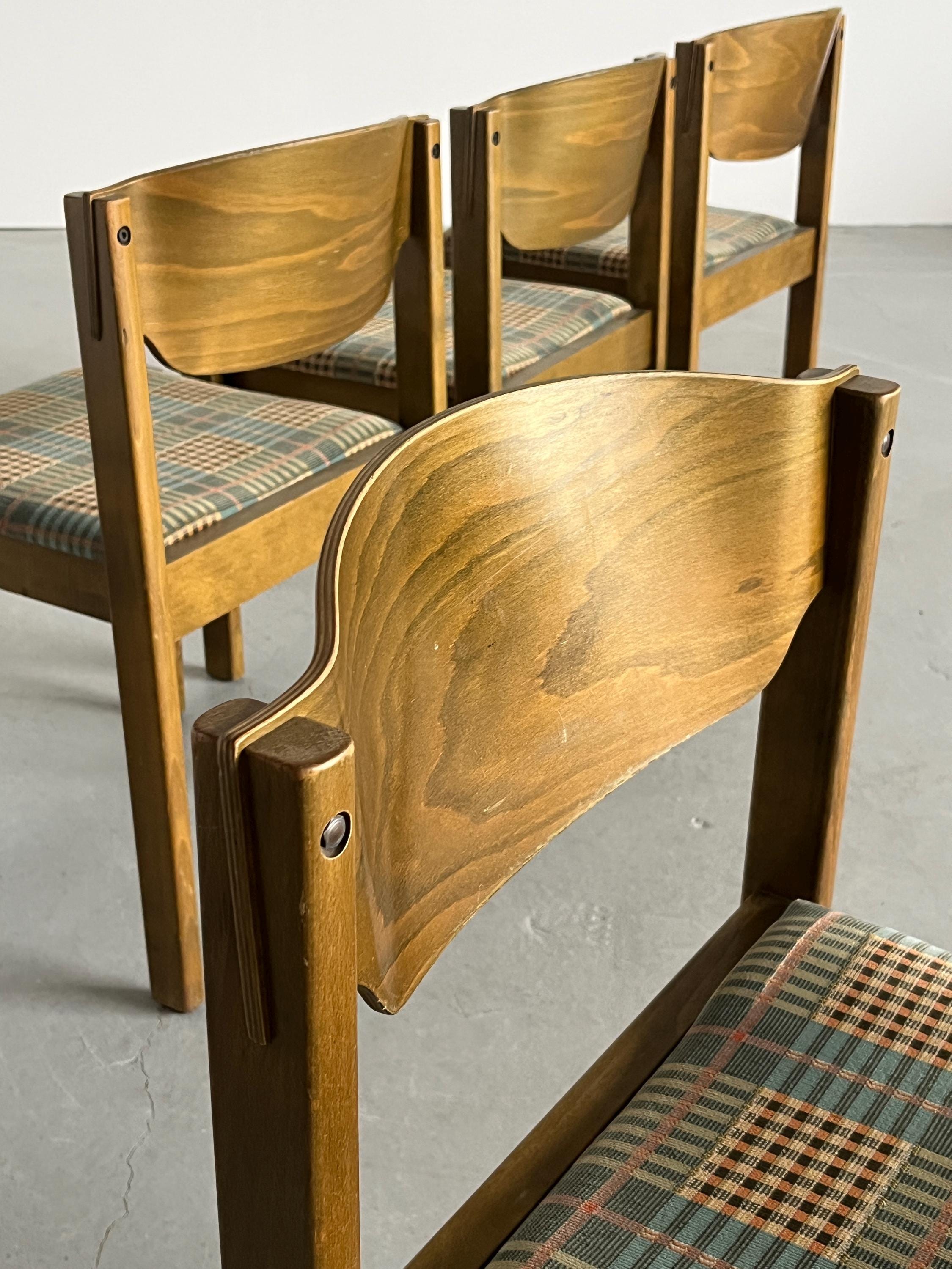 Stackable Dining Chairs in the Style of Roland Rainer