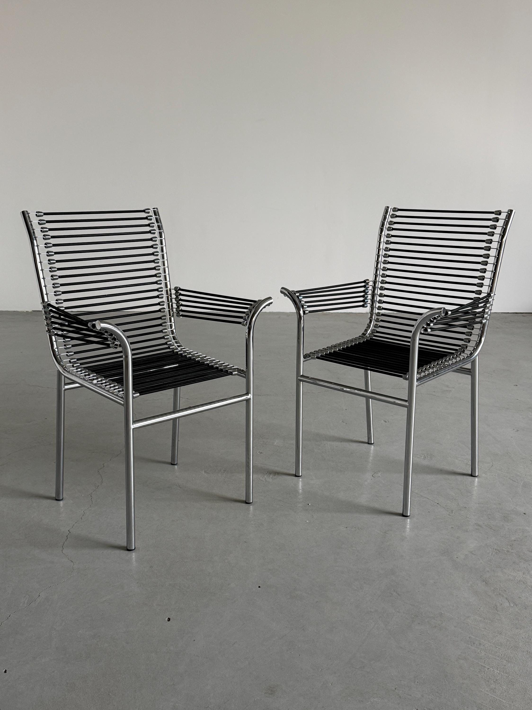 René Herbst 'Sandows' Armchairs