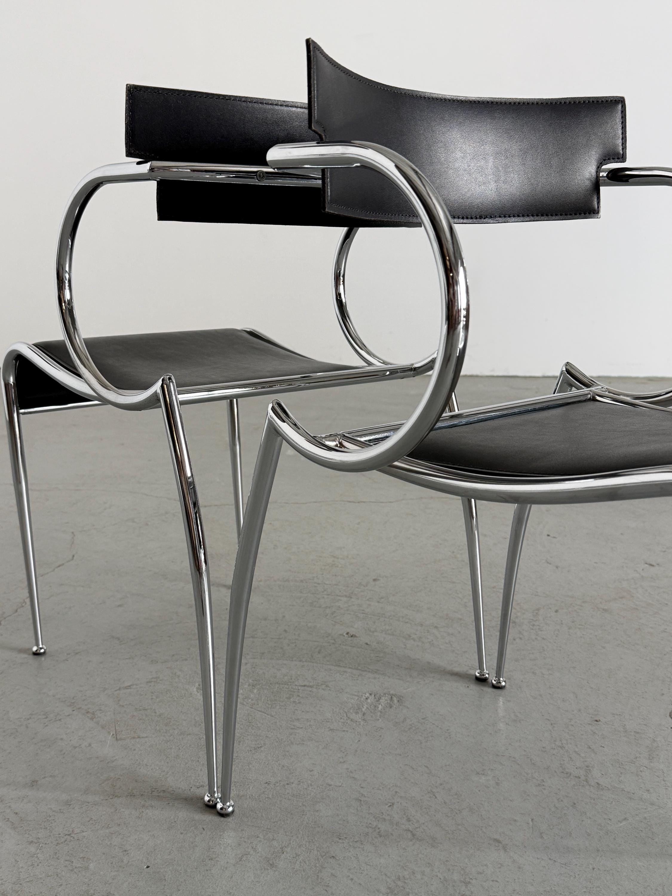 Curved Chrome and Black Leather Dining Chairs