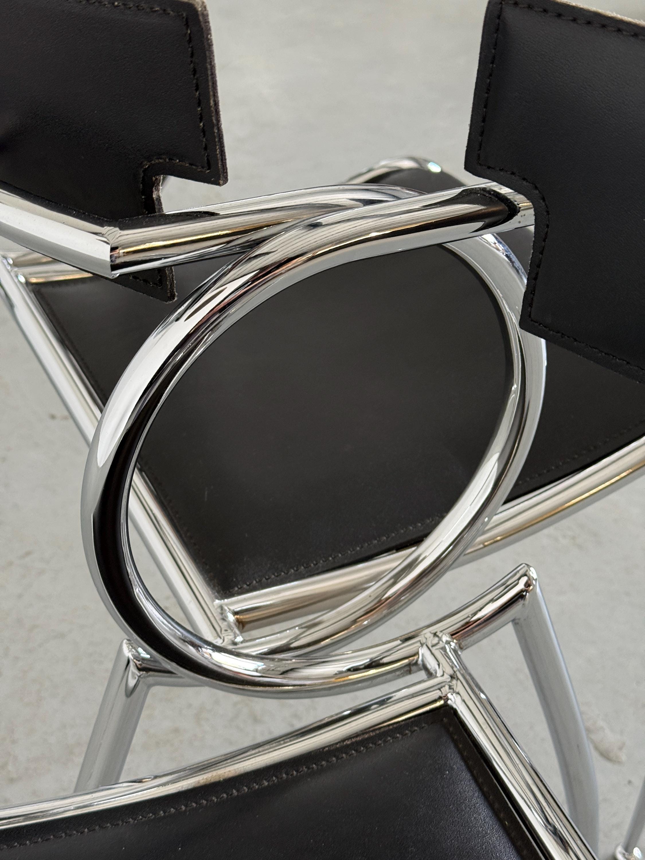 Curved Chrome and Black Leather Dining Chairs