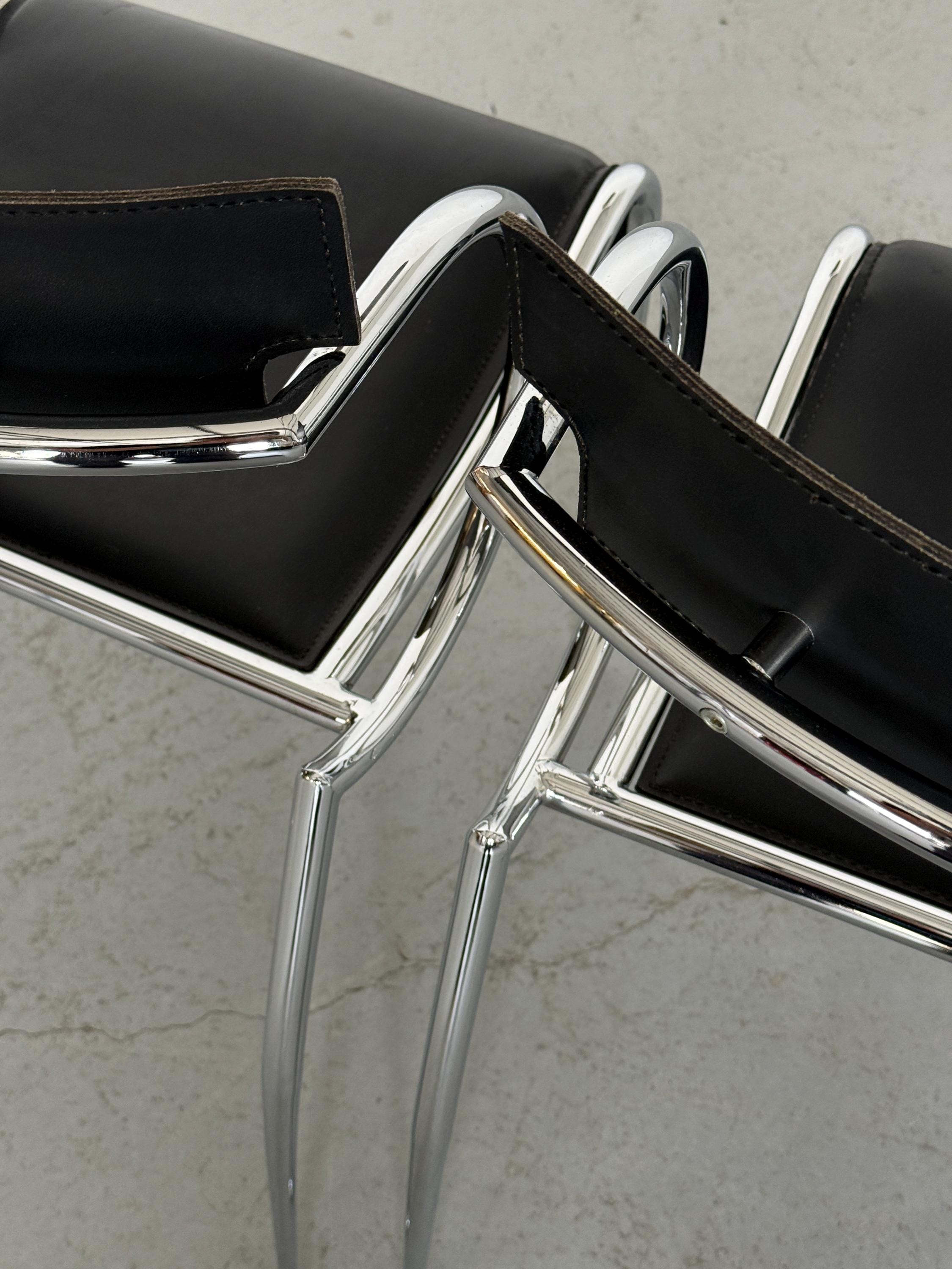Curved Chrome and Black Leather Dining Chairs