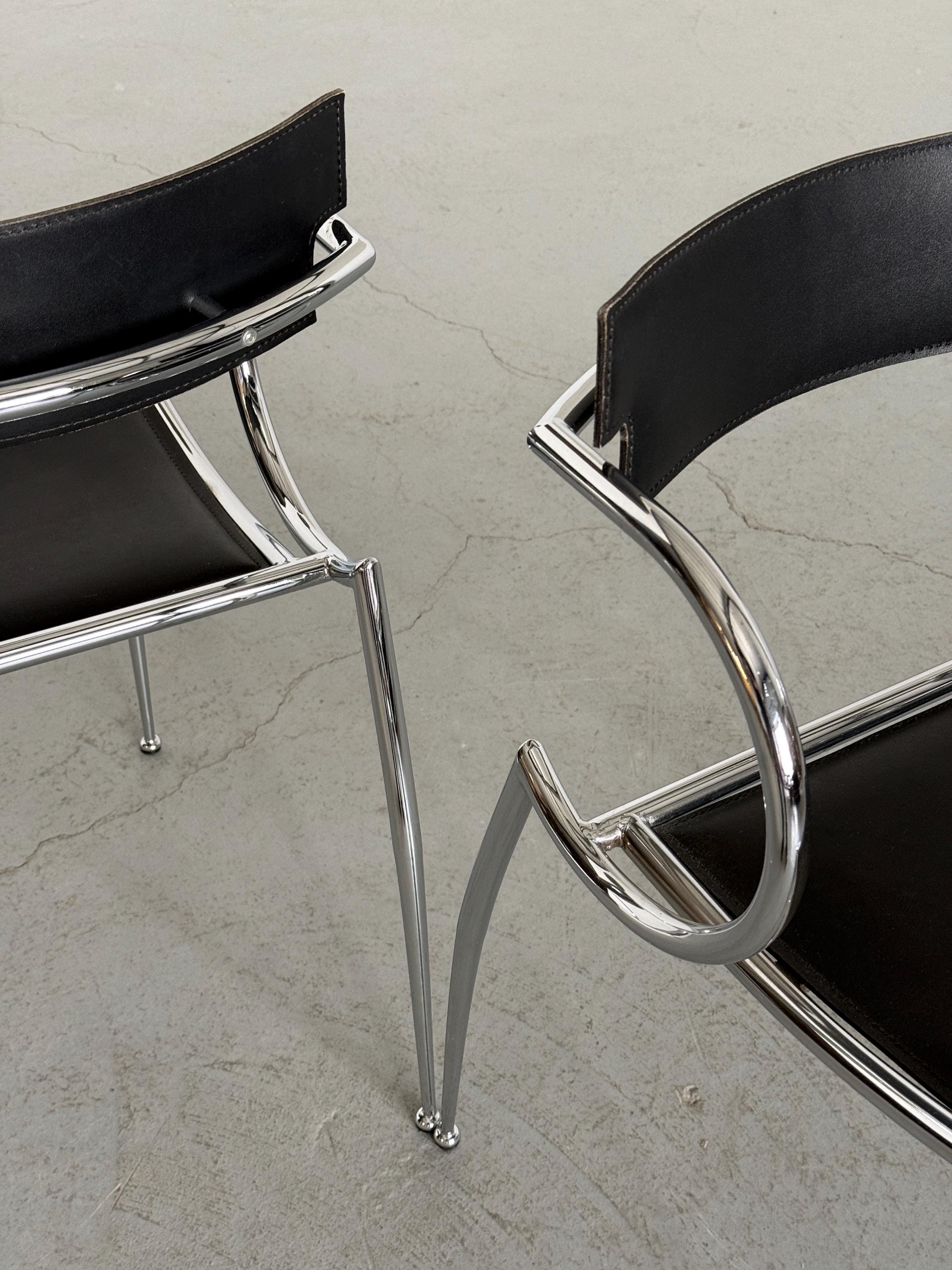 Curved Chrome and Black Leather Dining Chairs