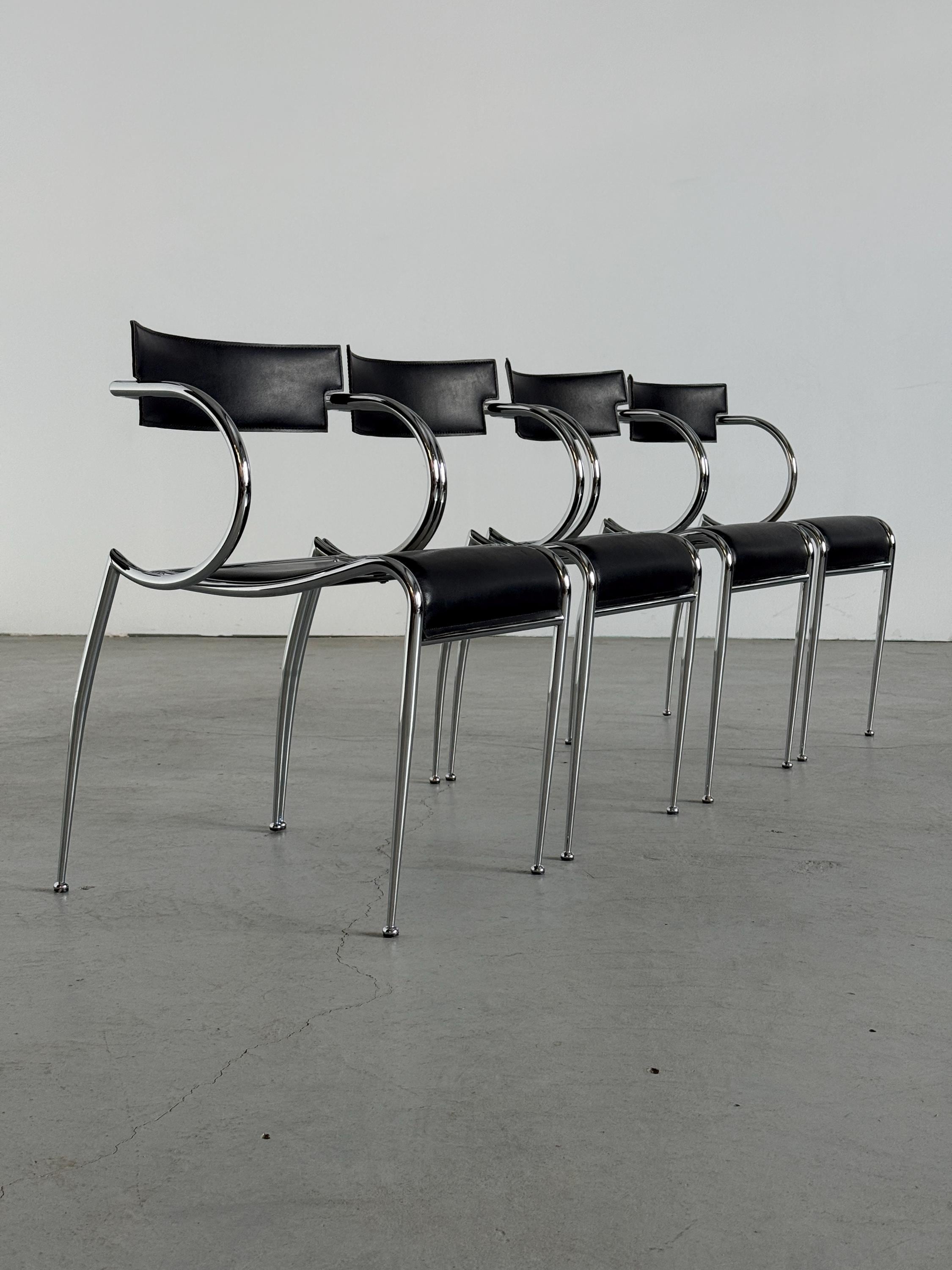 Curved Chrome and Black Leather Dining Chairs