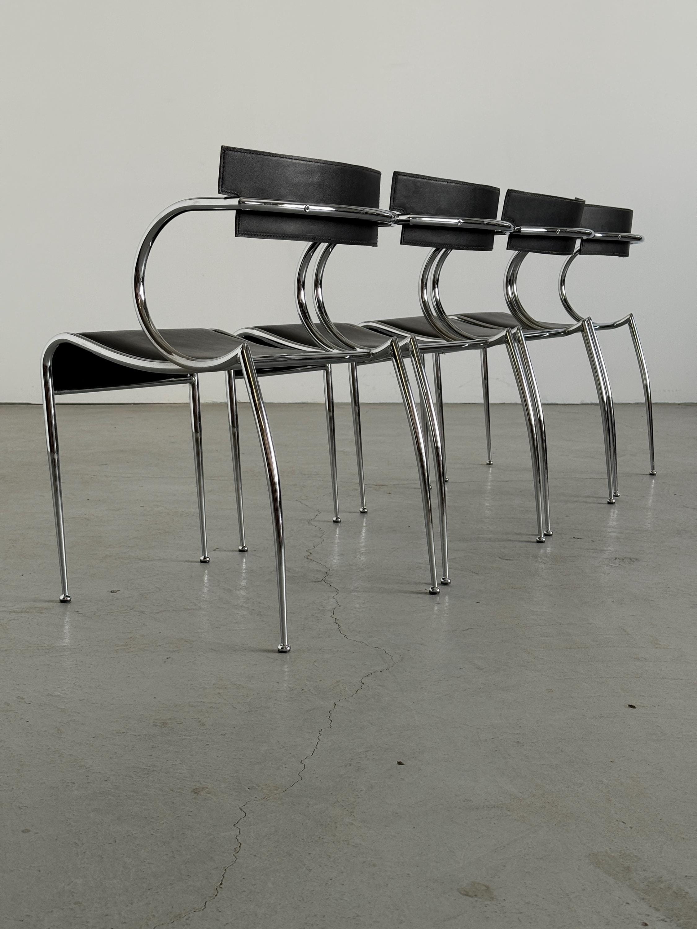 Curved Chrome and Black Leather Dining Chairs
