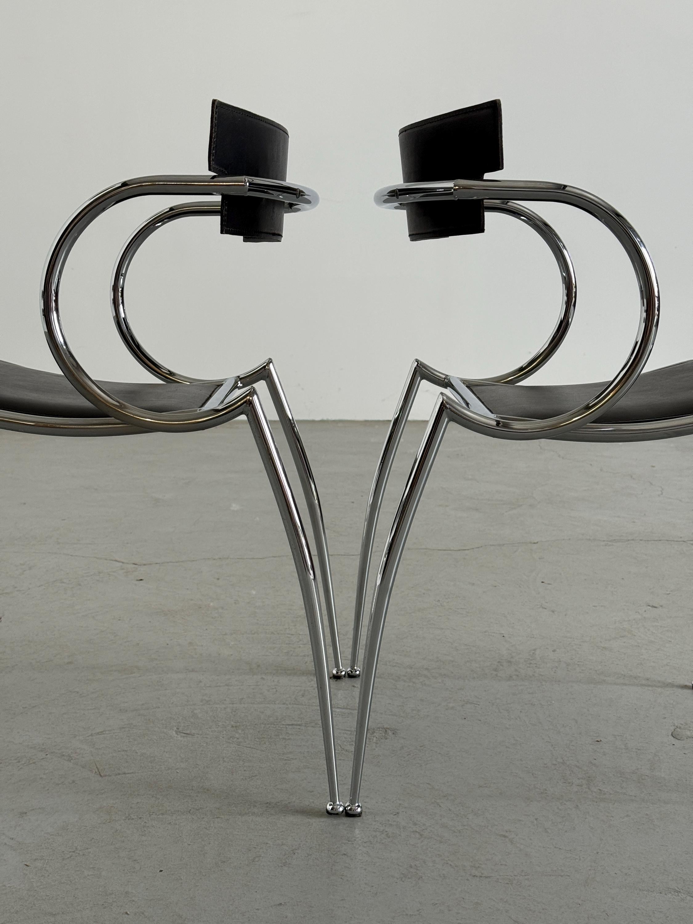 Curved Chrome and Black Leather Dining Chairs