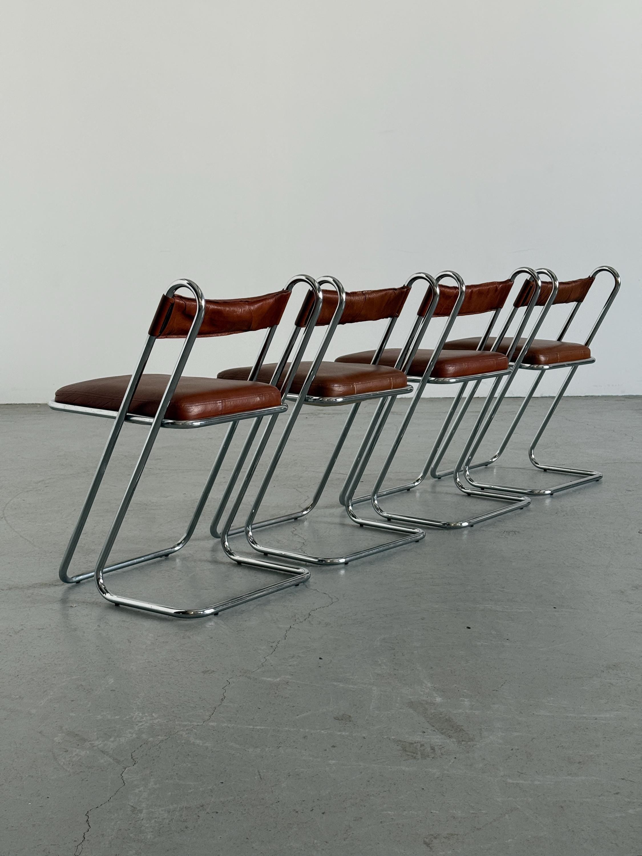 Postmodern Chrome and Leather Dining Chairs