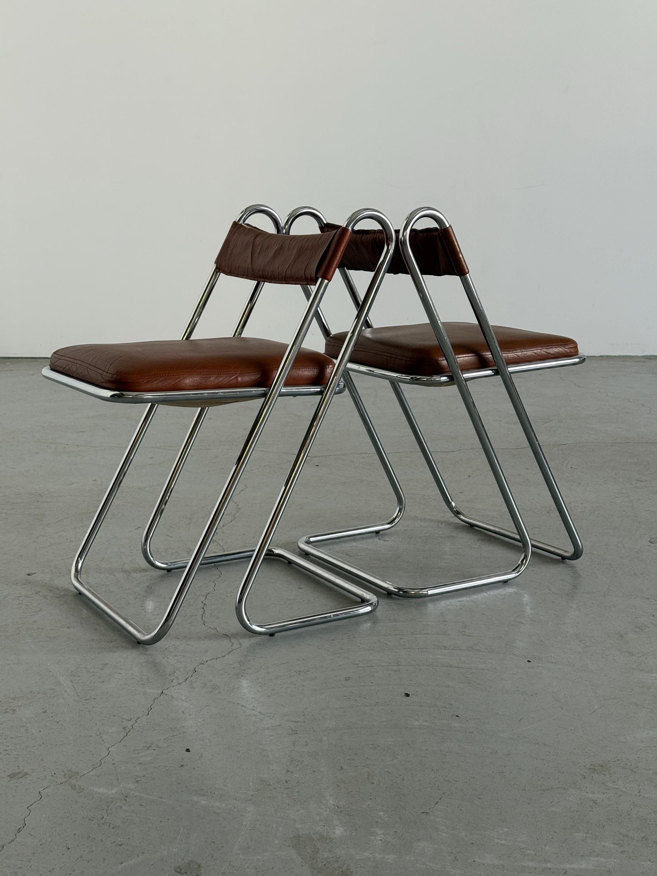 Postmodern Chrome and Leather Dining Chairs