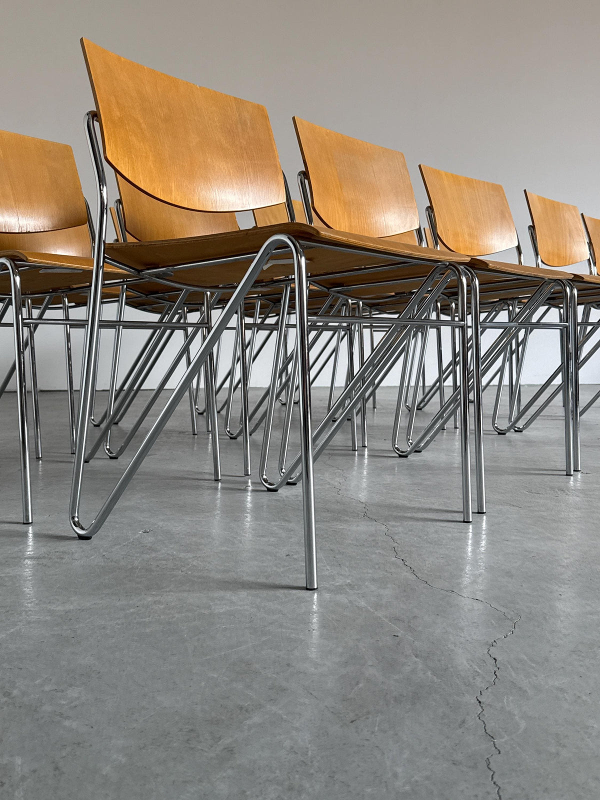 Chrome and Beech Plywood Stacking Chairs