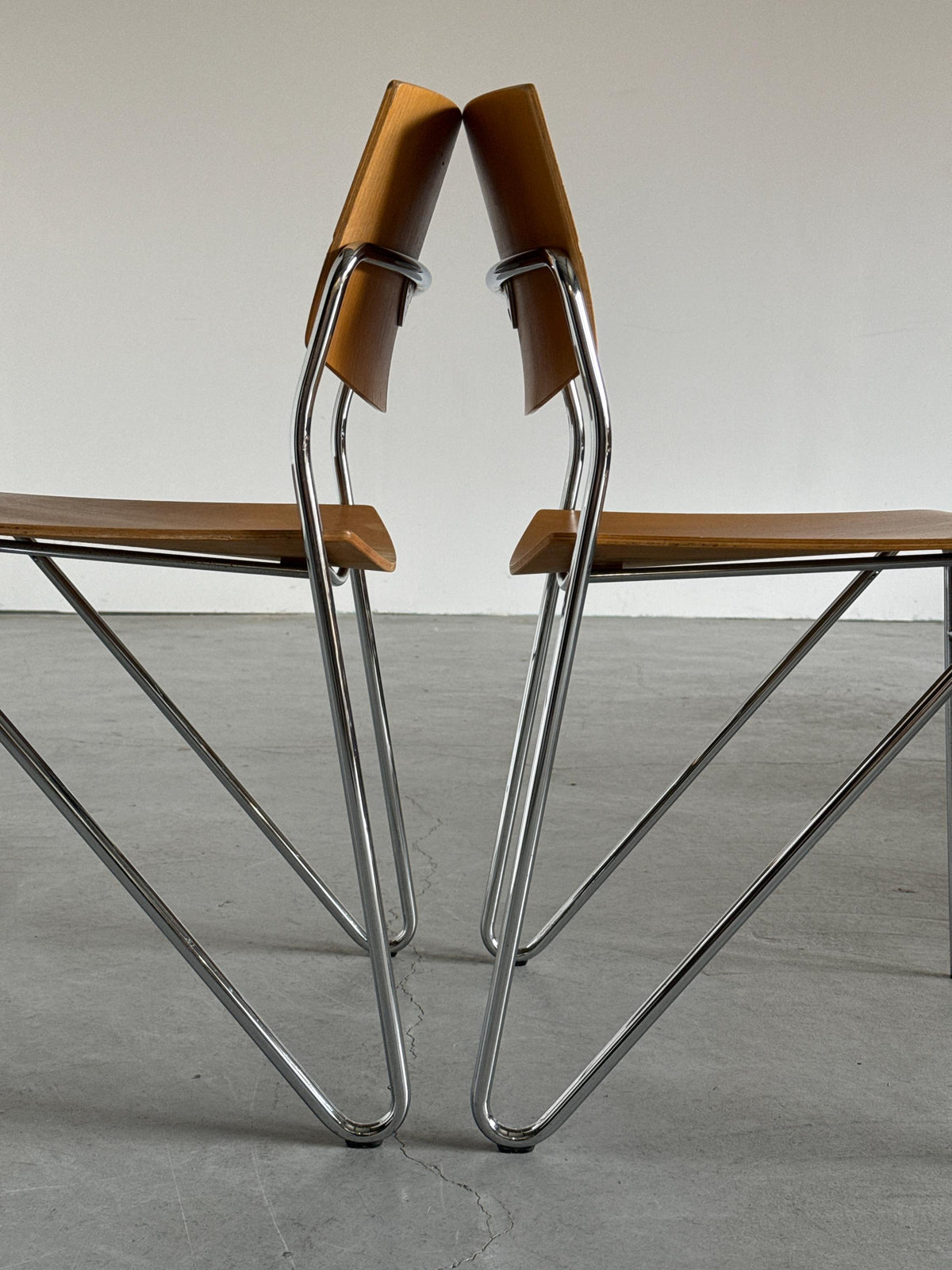 Chrome and Beech Plywood Stacking Chairs