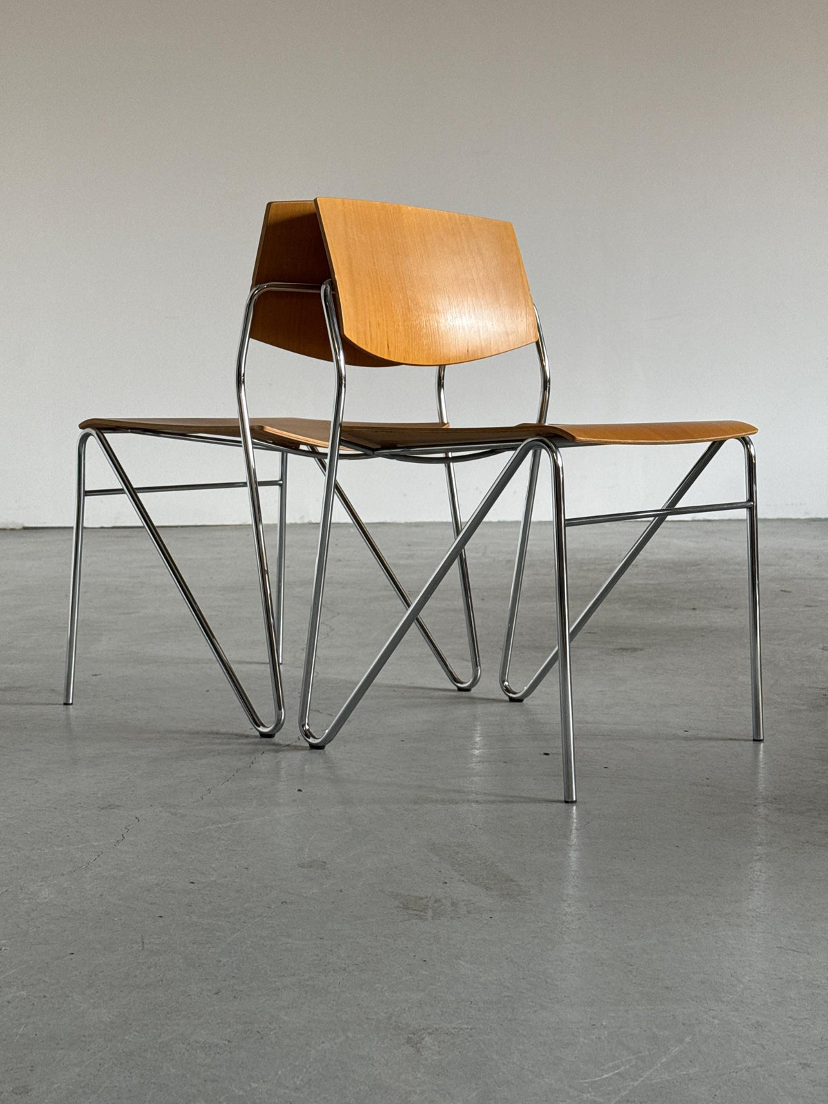 Chrome and Beech Plywood Stacking Chairs