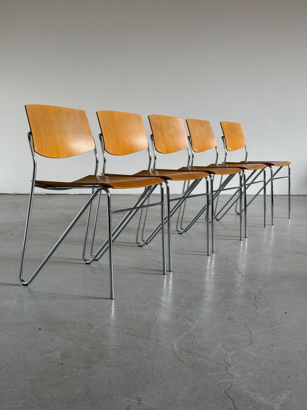 Chrome and Beech Plywood Stacking Chairs