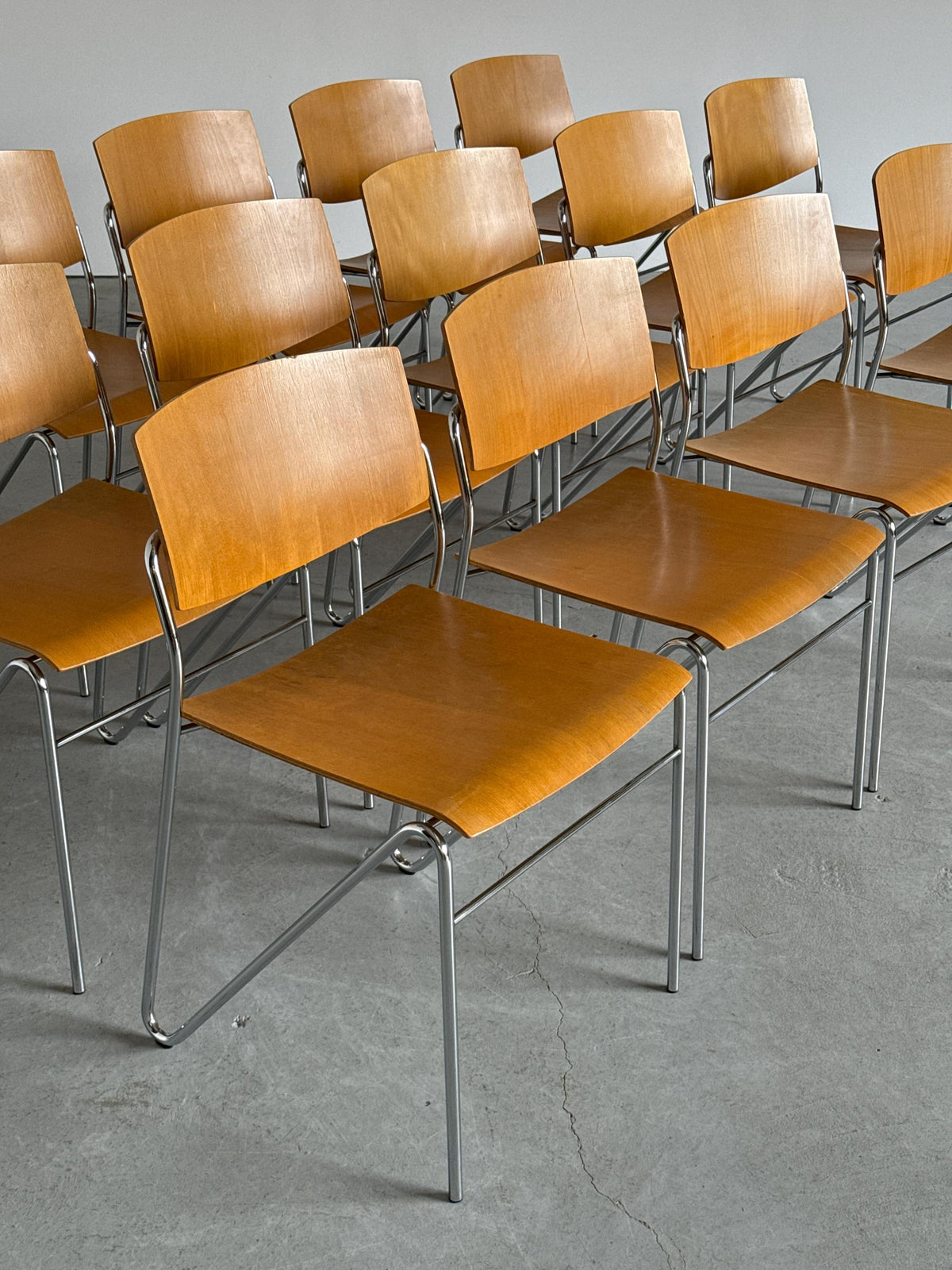 Chrome and Beech Plywood Stacking Chairs