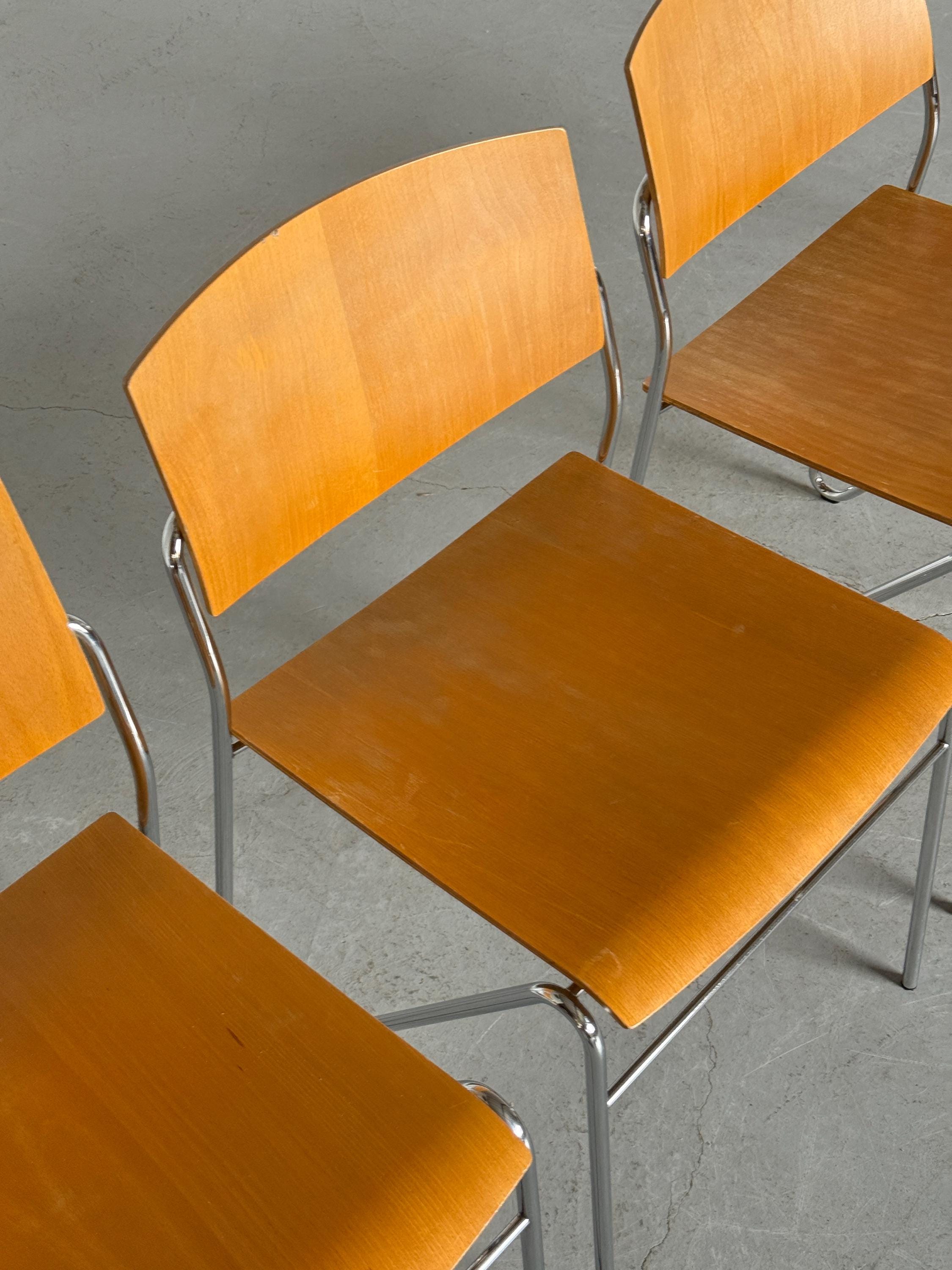 Chrome and Beech Plywood Stacking Chairs