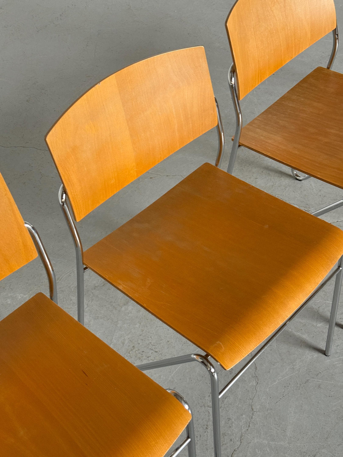 Chrome and Beech Plywood Stacking Chairs