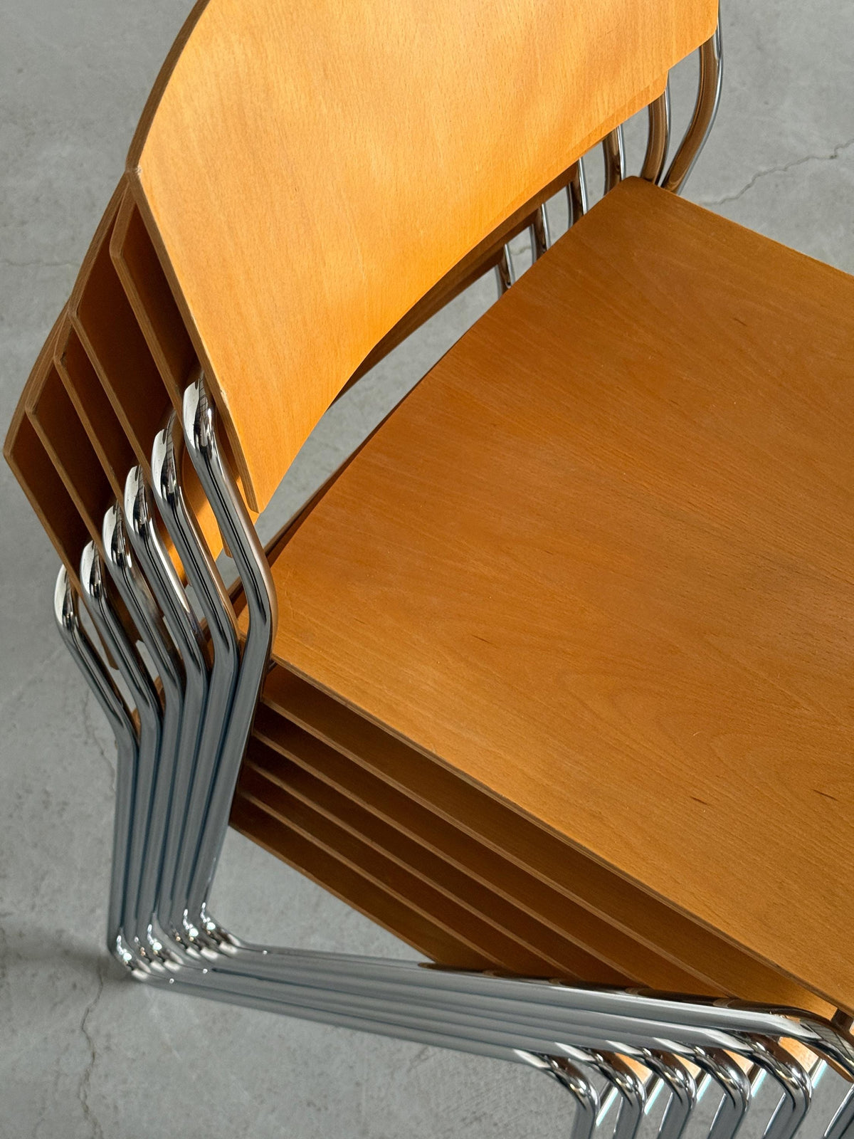Chrome and Beech Plywood Stacking Chairs