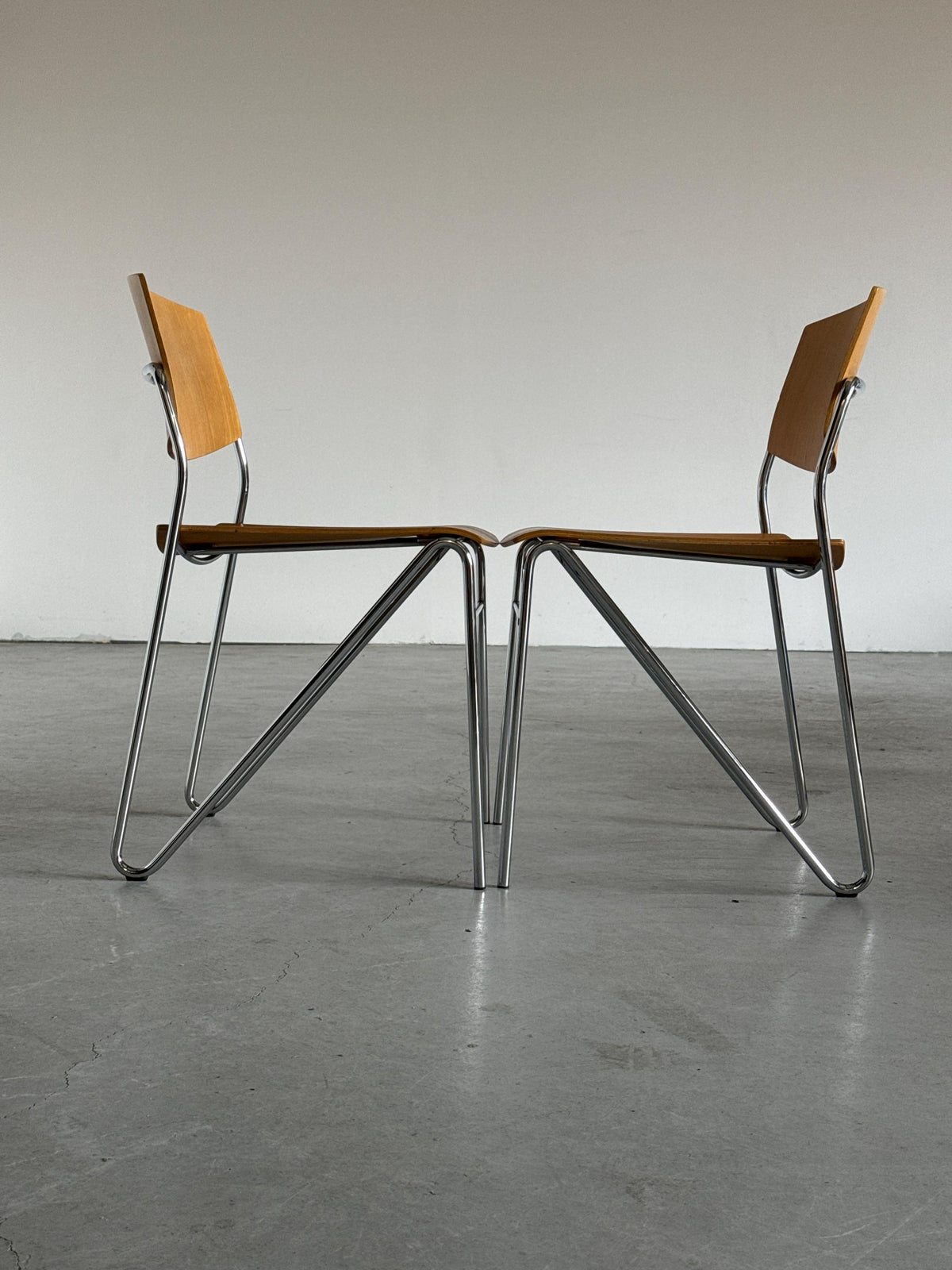 Chrome and Beech Plywood Stacking Chairs