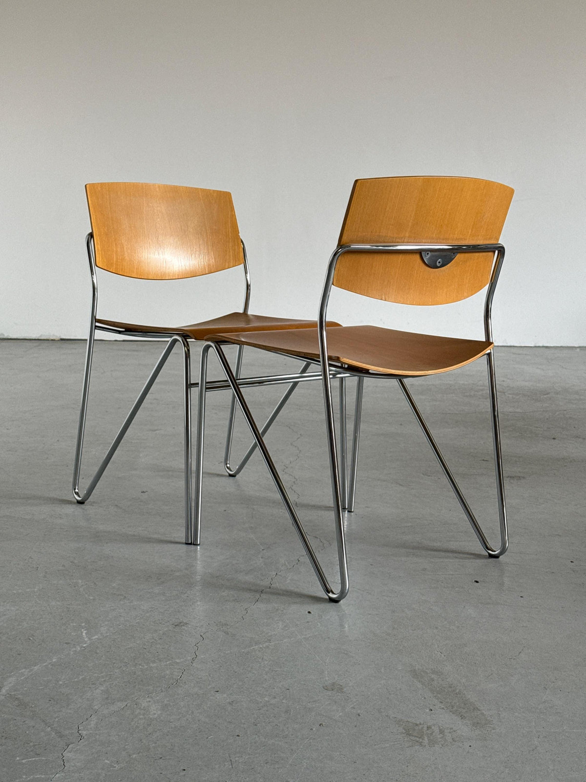 Chrome and Beech Plywood Stacking Chairs