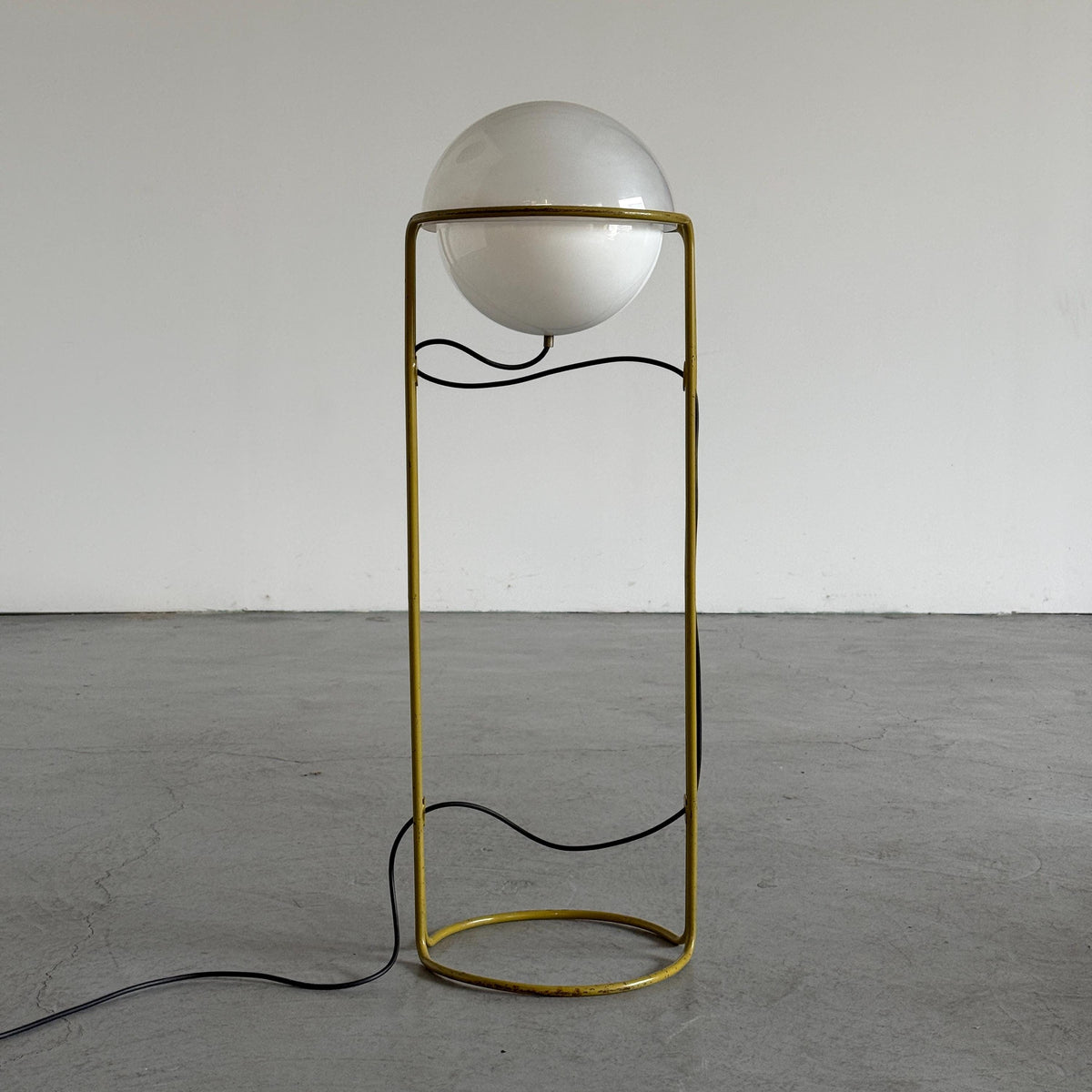 Globe Floor Lamp with Tubular Yellow Metal