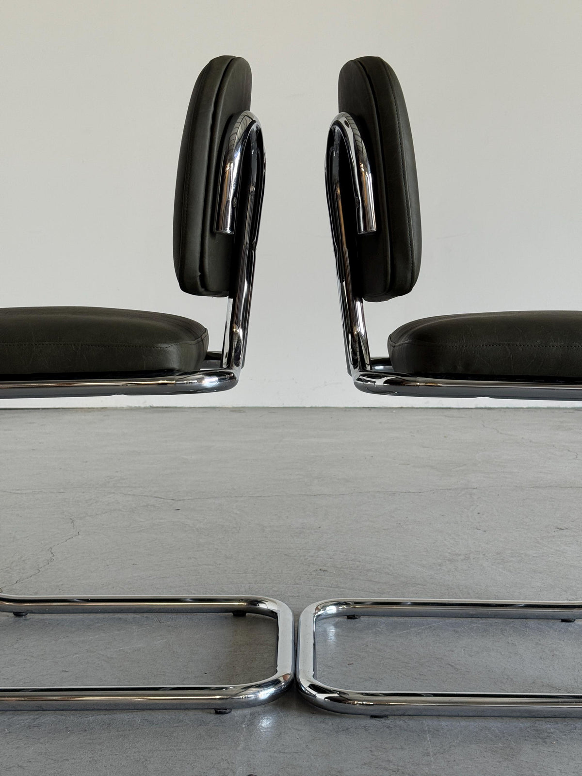 Faded Green Faux Leather Cantilever Chair